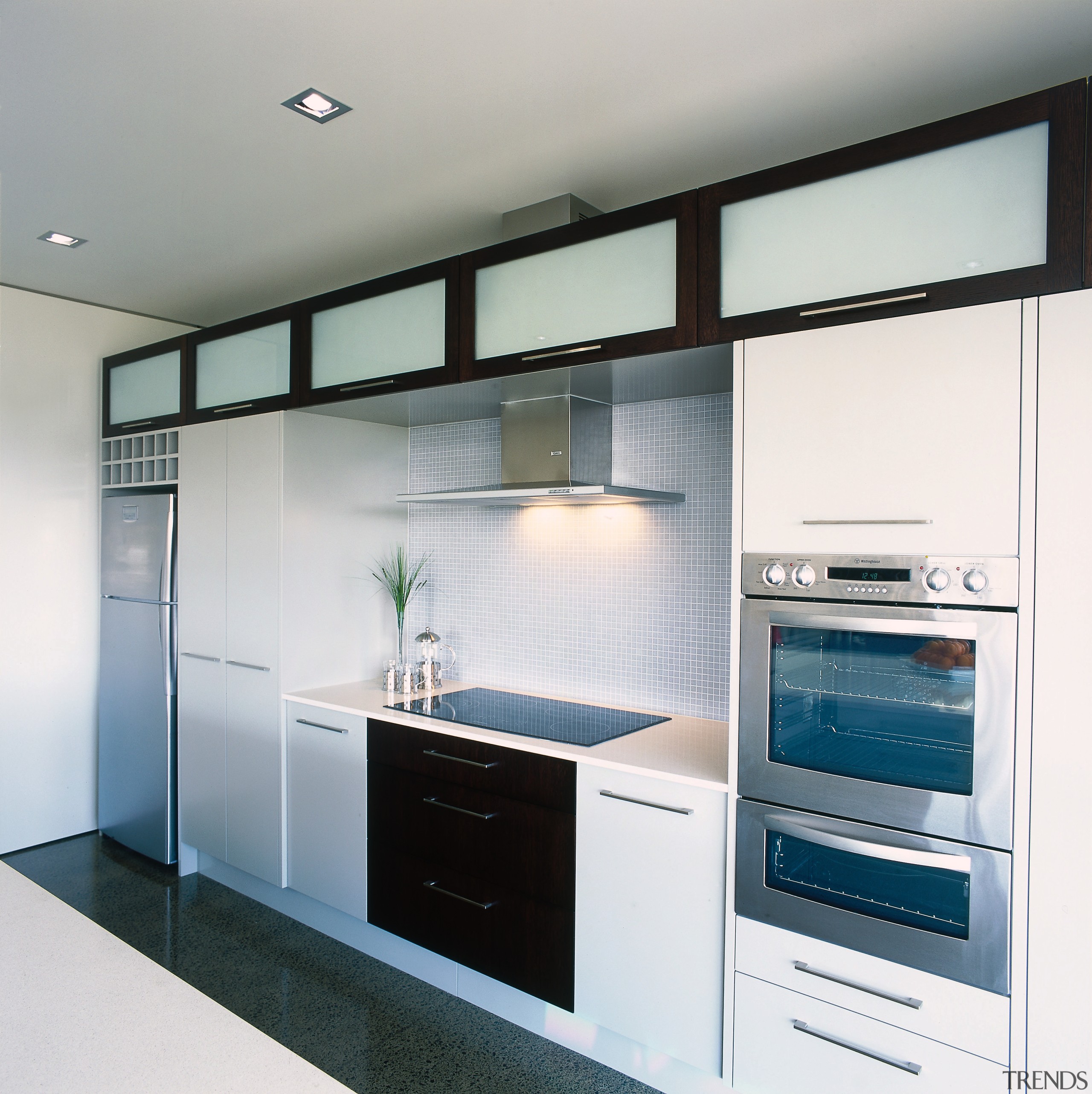 View of this contemporary kitchen - View of cabinetry, countertop, home appliance, interior design, kitchen, major appliance, white, gray