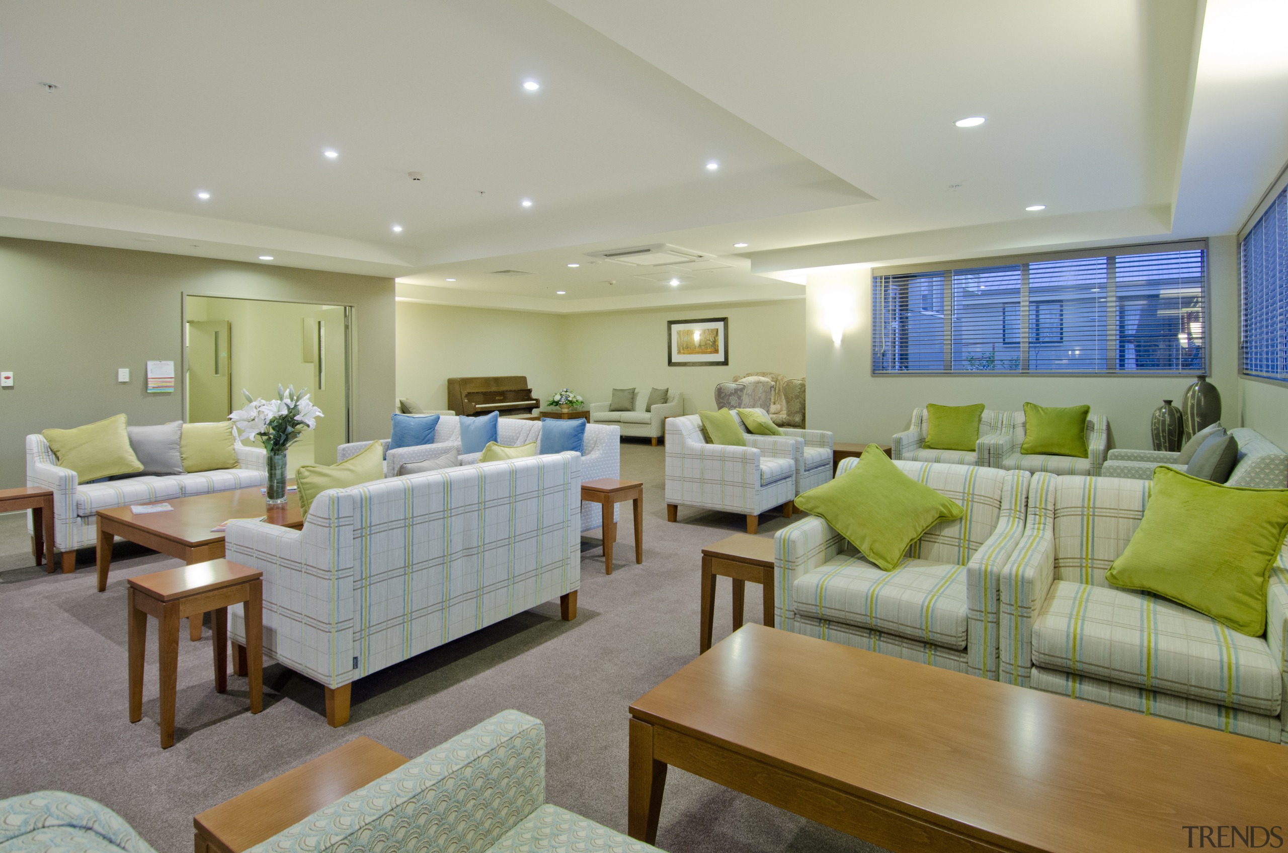 Bupa Parklands on Papanui Village features a wide ceiling, estate, home, interior design, living room, real estate, room, suite, gray