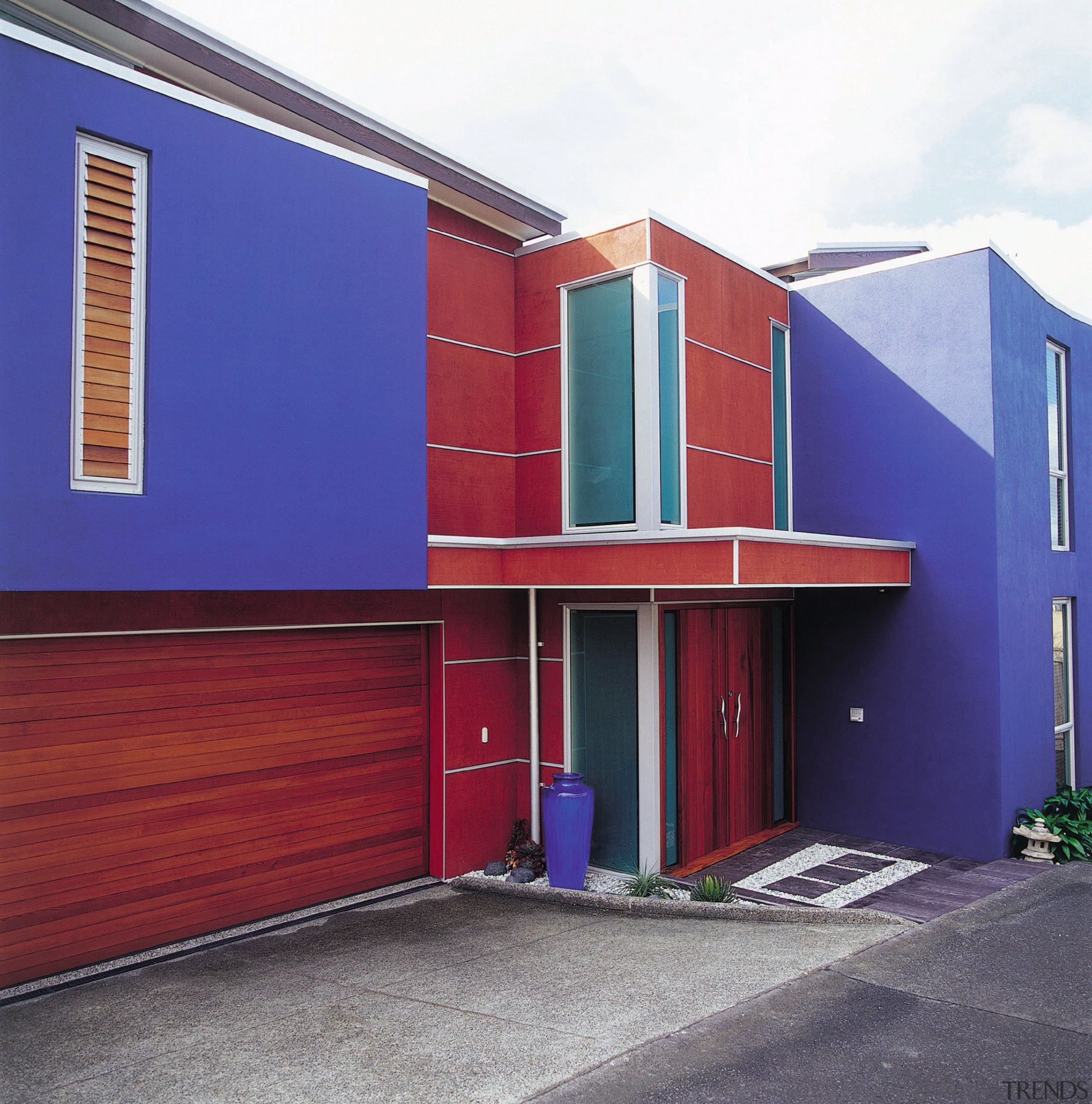 view of this colourful home using textured shadowclad architecture, building, commercial building, door, elevation, facade, home, house, property, real estate, residential area, siding, blue