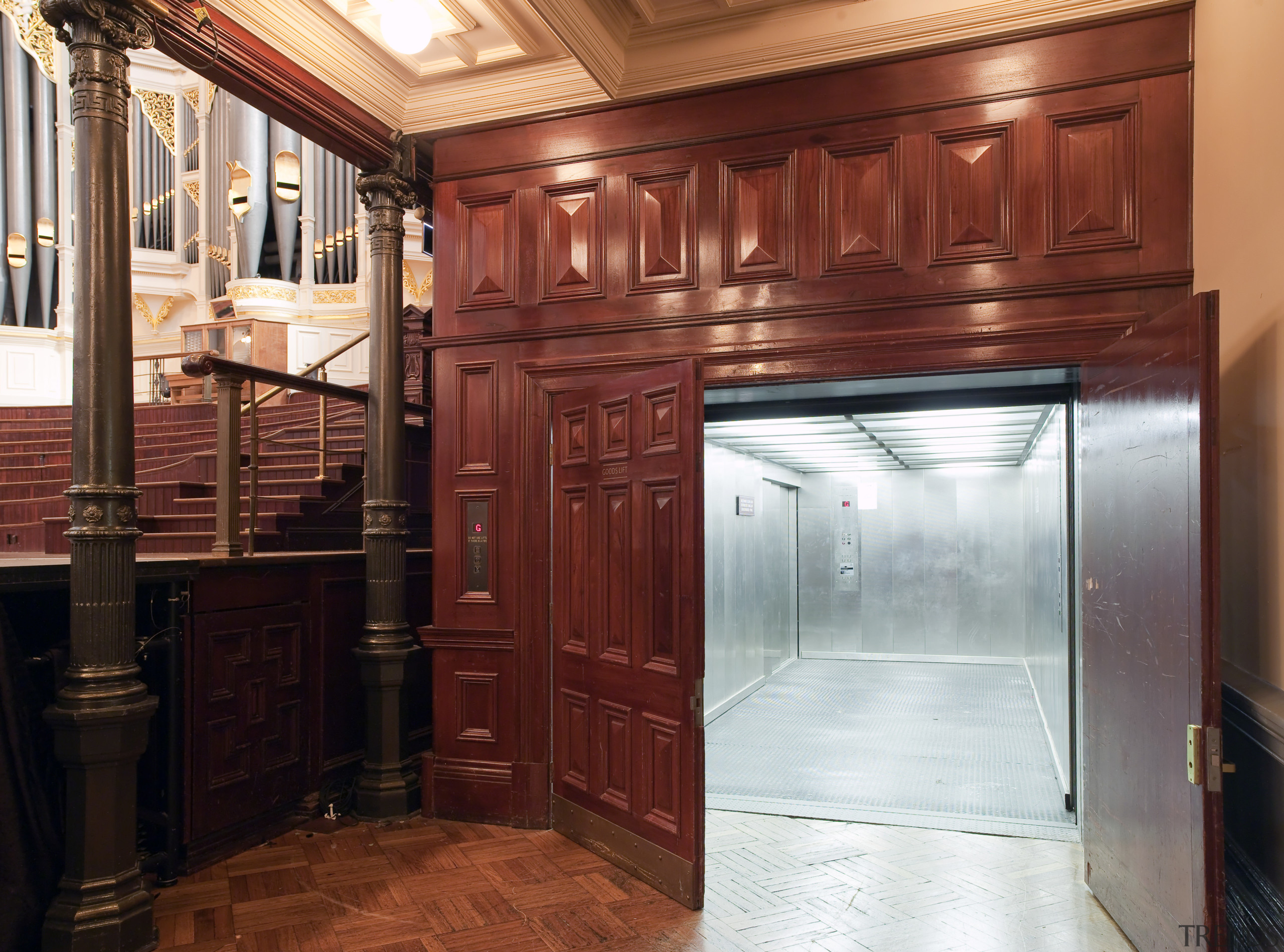 View of lifts in the renovated historic Sydney cabinetry, door, hardwood, home, interior design, real estate, wood, wood stain, red