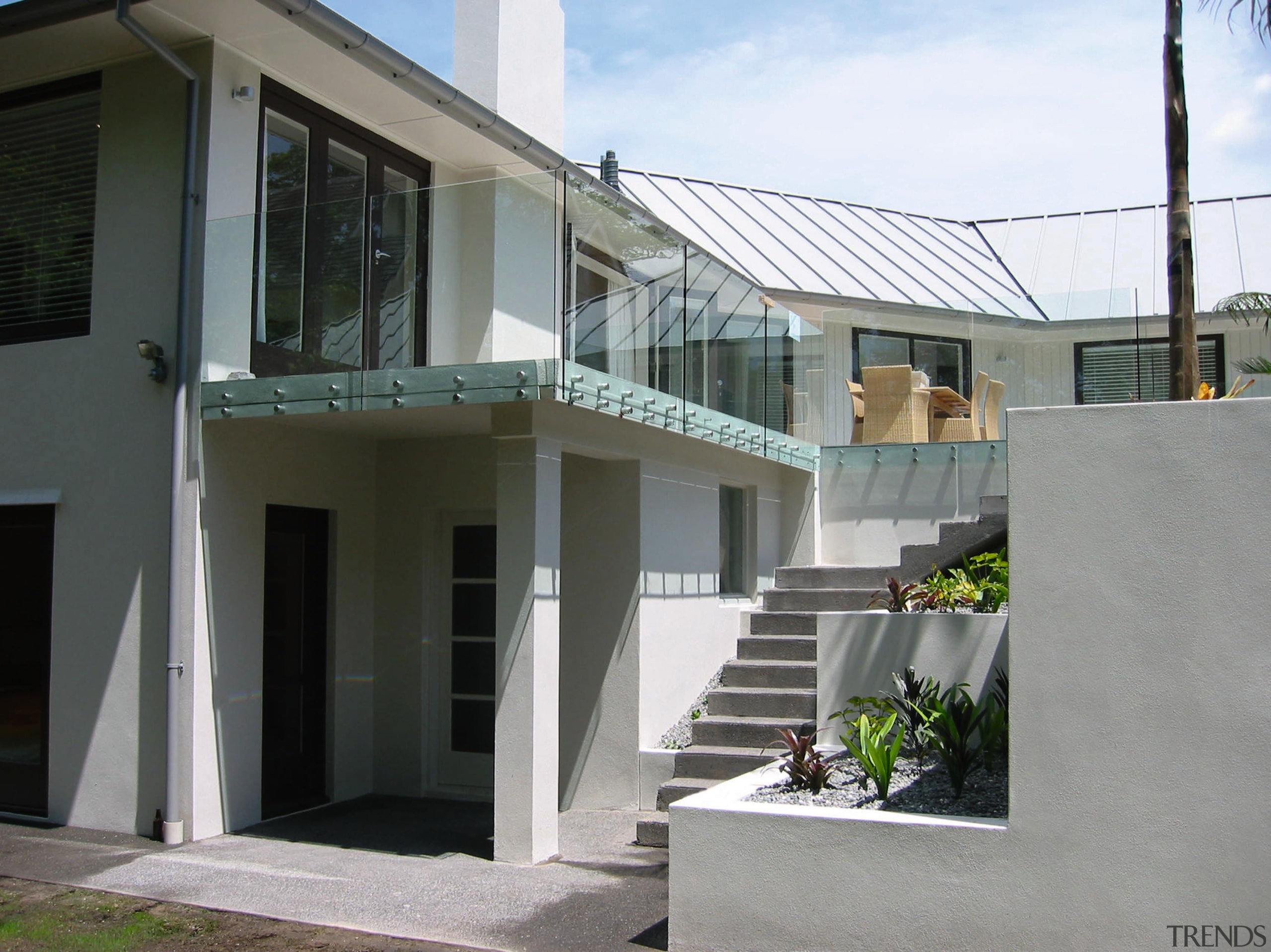 view of the glazed balutrades on the  architecture, building, elevation, facade, handrail, home, house, property, real estate, residential area, window, gray, black