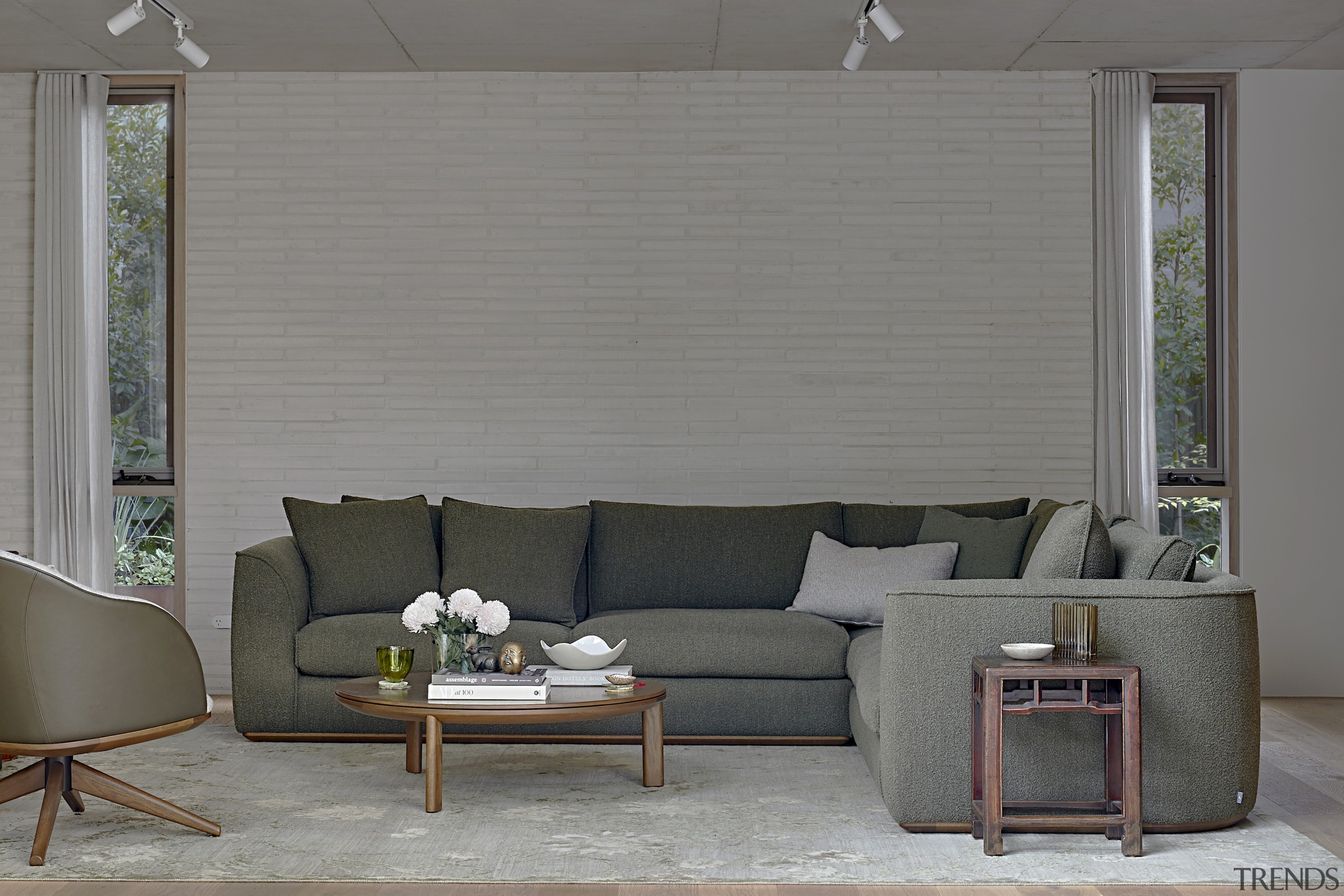 Living room in refined/subdued tones. - A home 