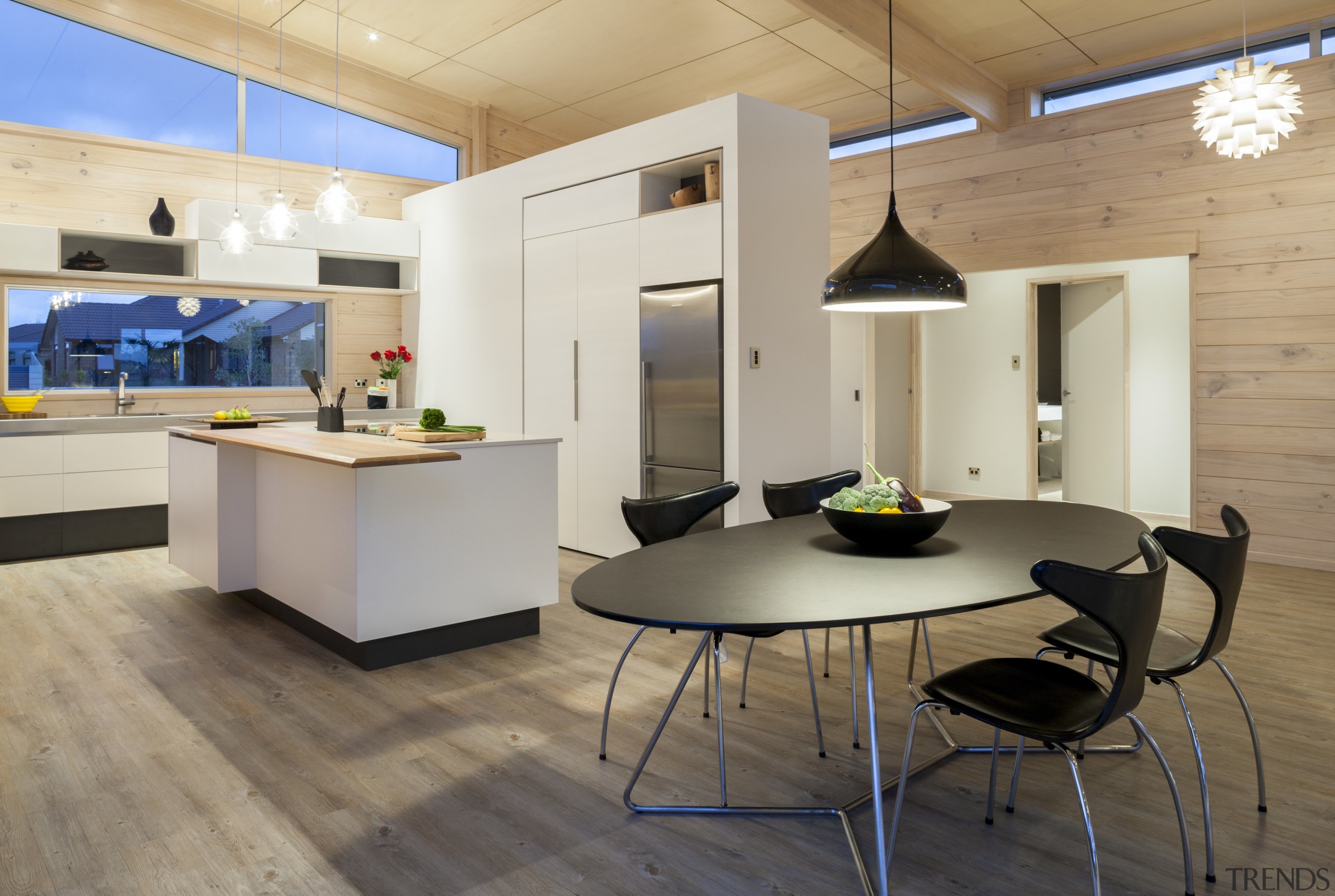 Lockwood show home Tauranga - White lacquered cabinetry architecture, ceiling, floor, flooring, furniture, interior design, kitchen, table, wood flooring, gray