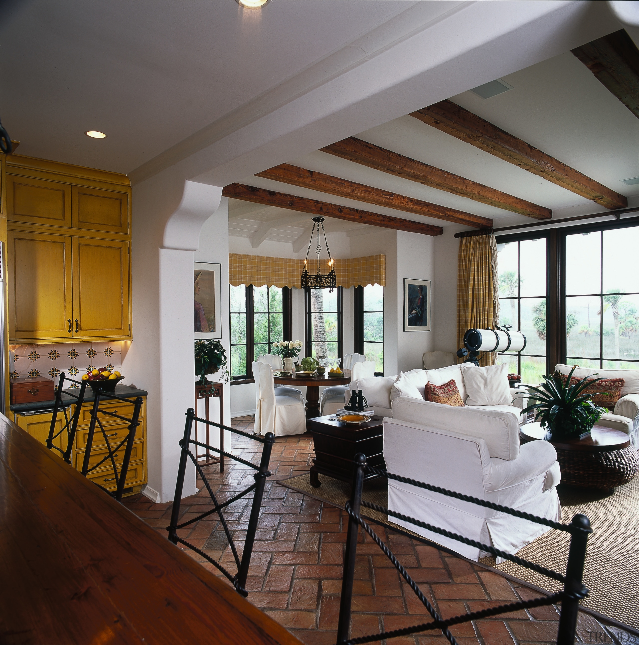View of the homes informal family and living ceiling, floor, flooring, home, interior design, living room, real estate, room, window, gray, brown