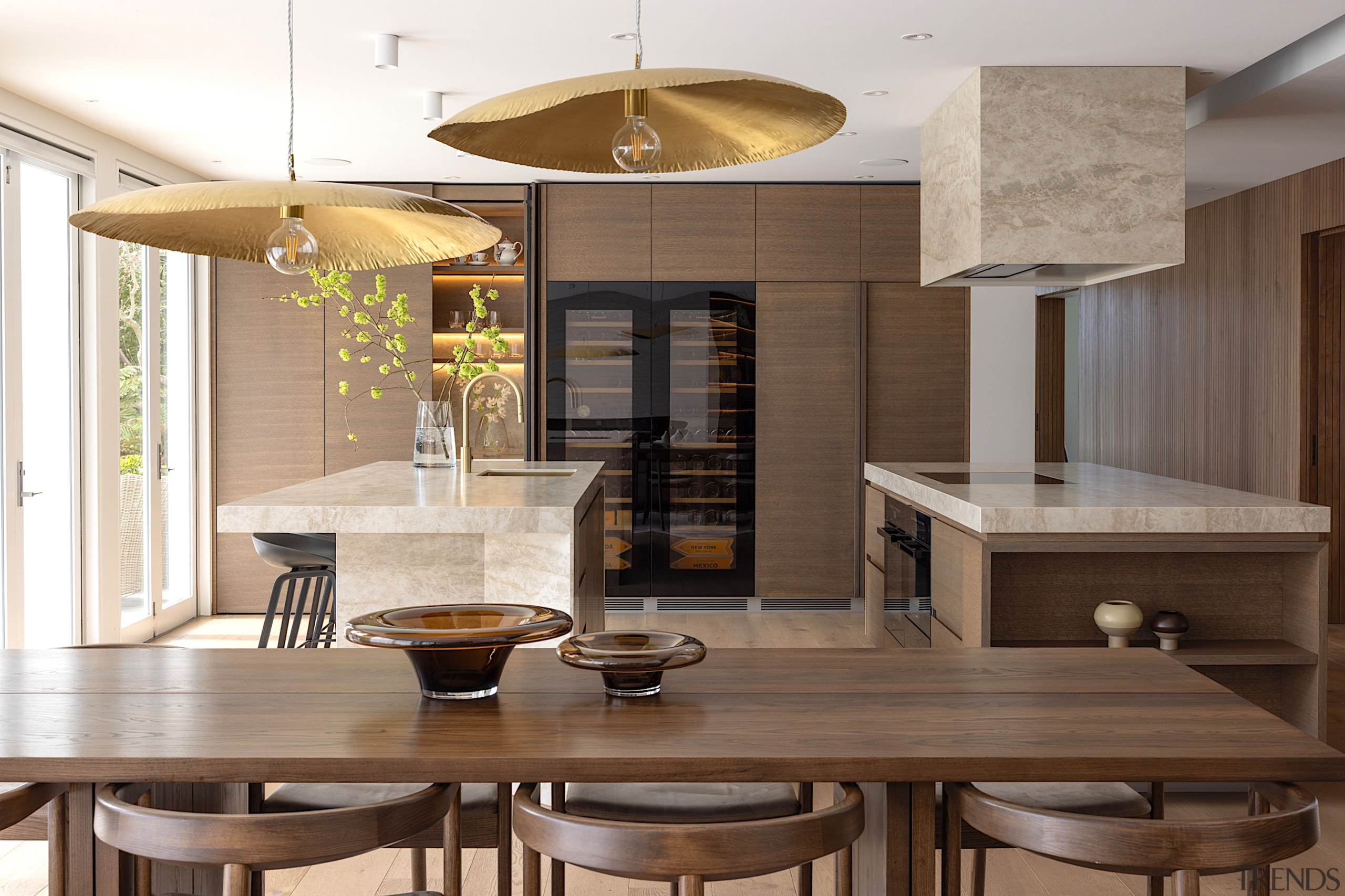 Warm wood tones predominate in the kitchen and 
