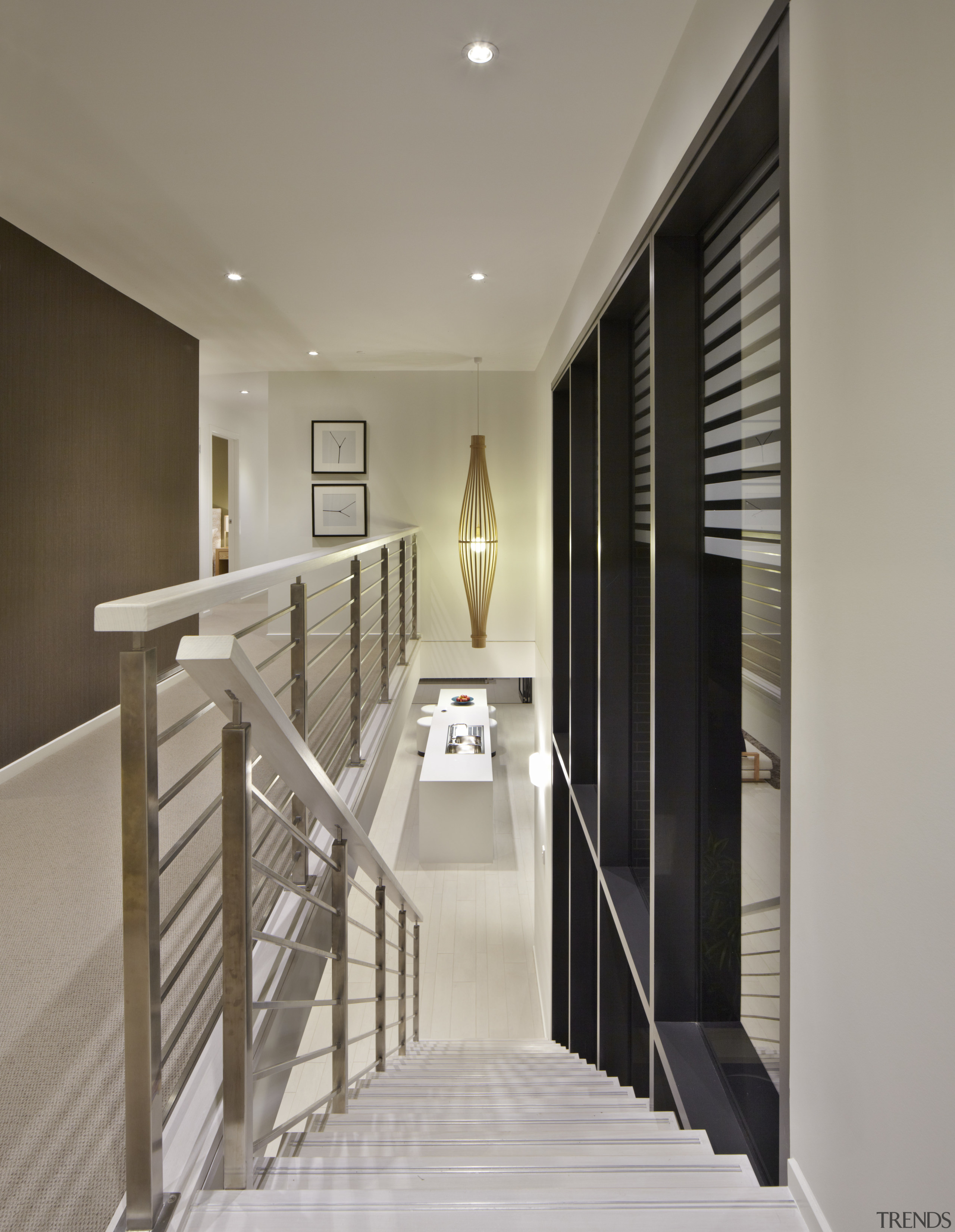 View down interior stairs. - View down interior architecture, ceiling, floor, flooring, handrail, home, house, interior design, real estate, stairs, gray