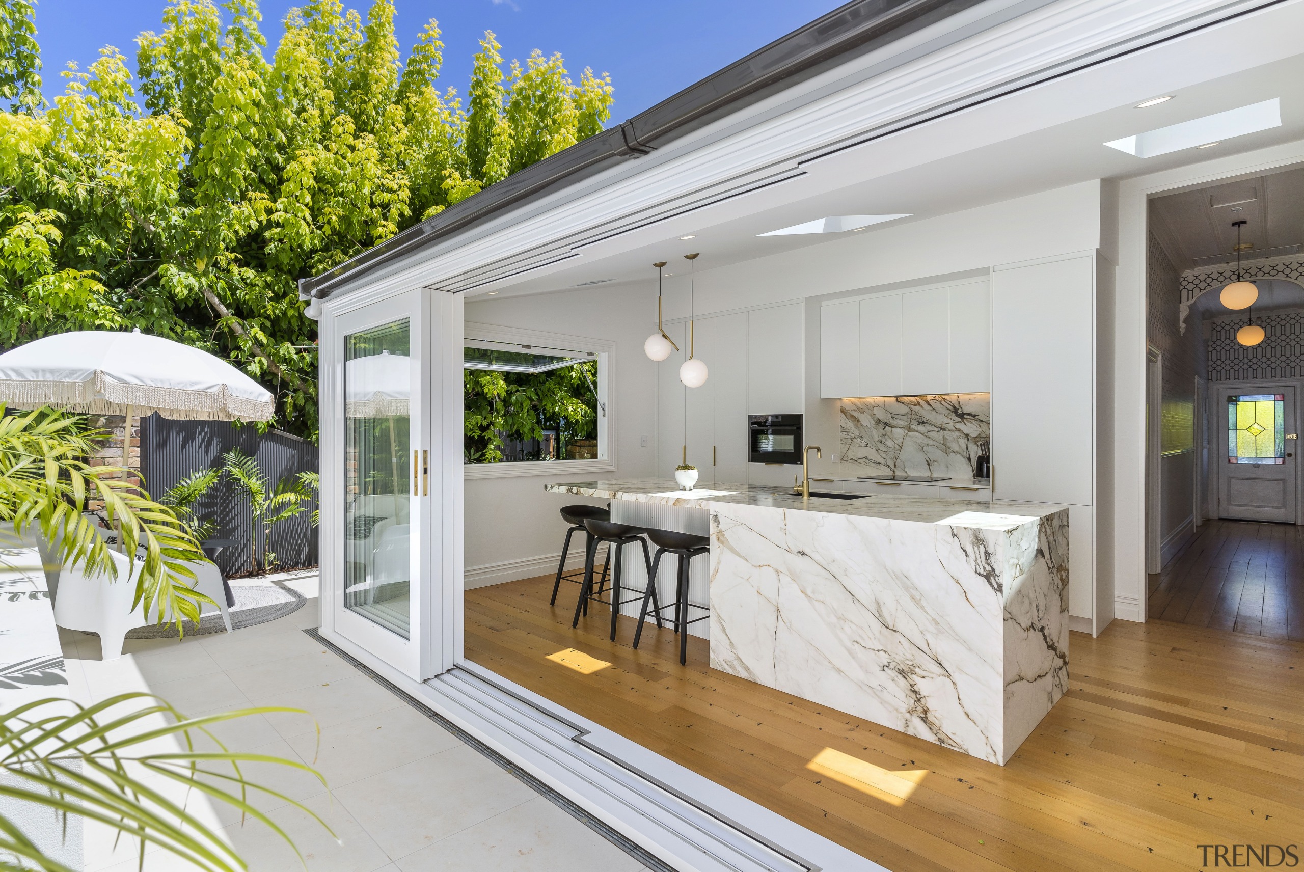 Sliders pull back to make indoors and outdoors 