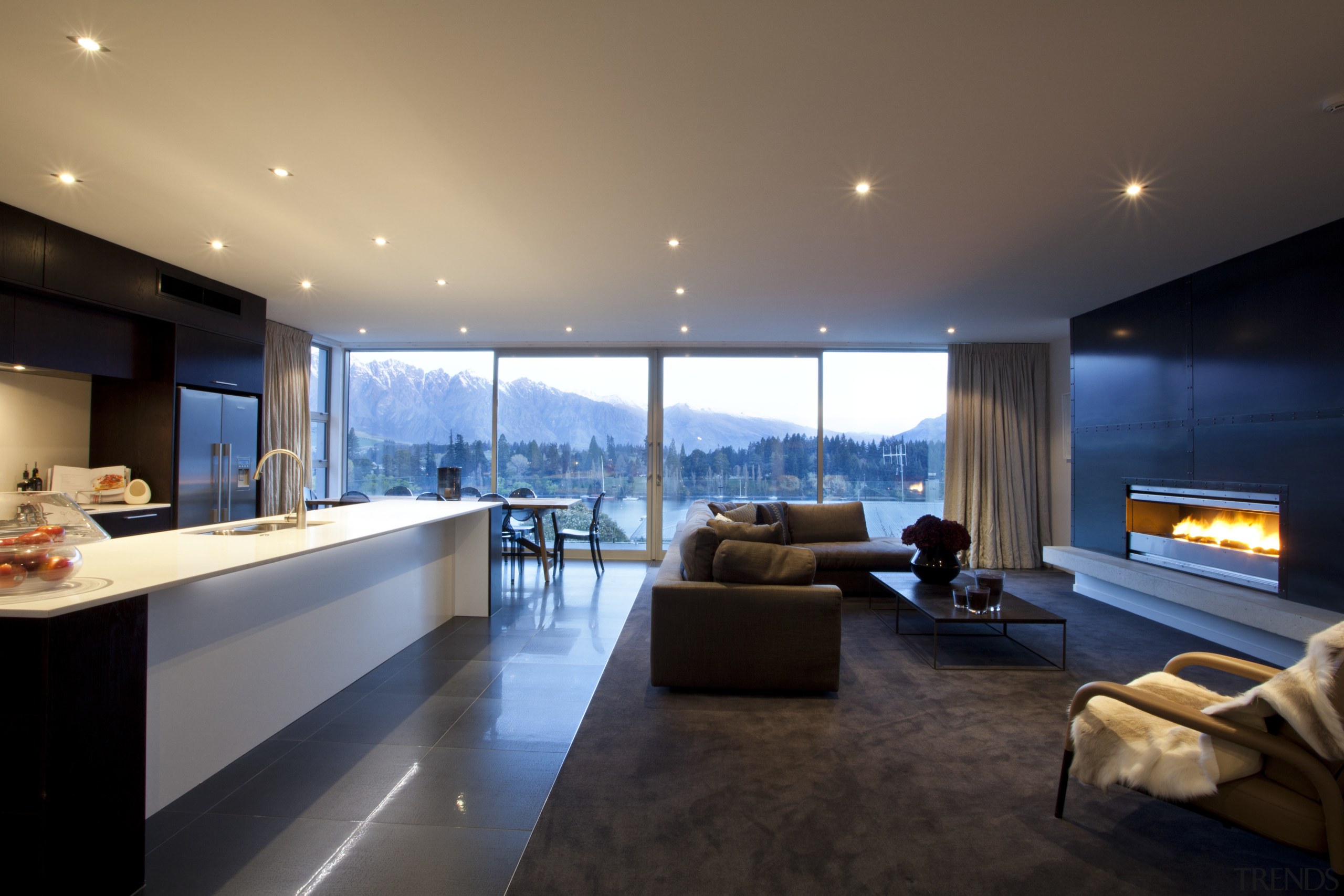 This home was designed by Allan Huntington of apartment, architecture, ceiling, house, interior design, lighting, living room, penthouse apartment, real estate, room, black