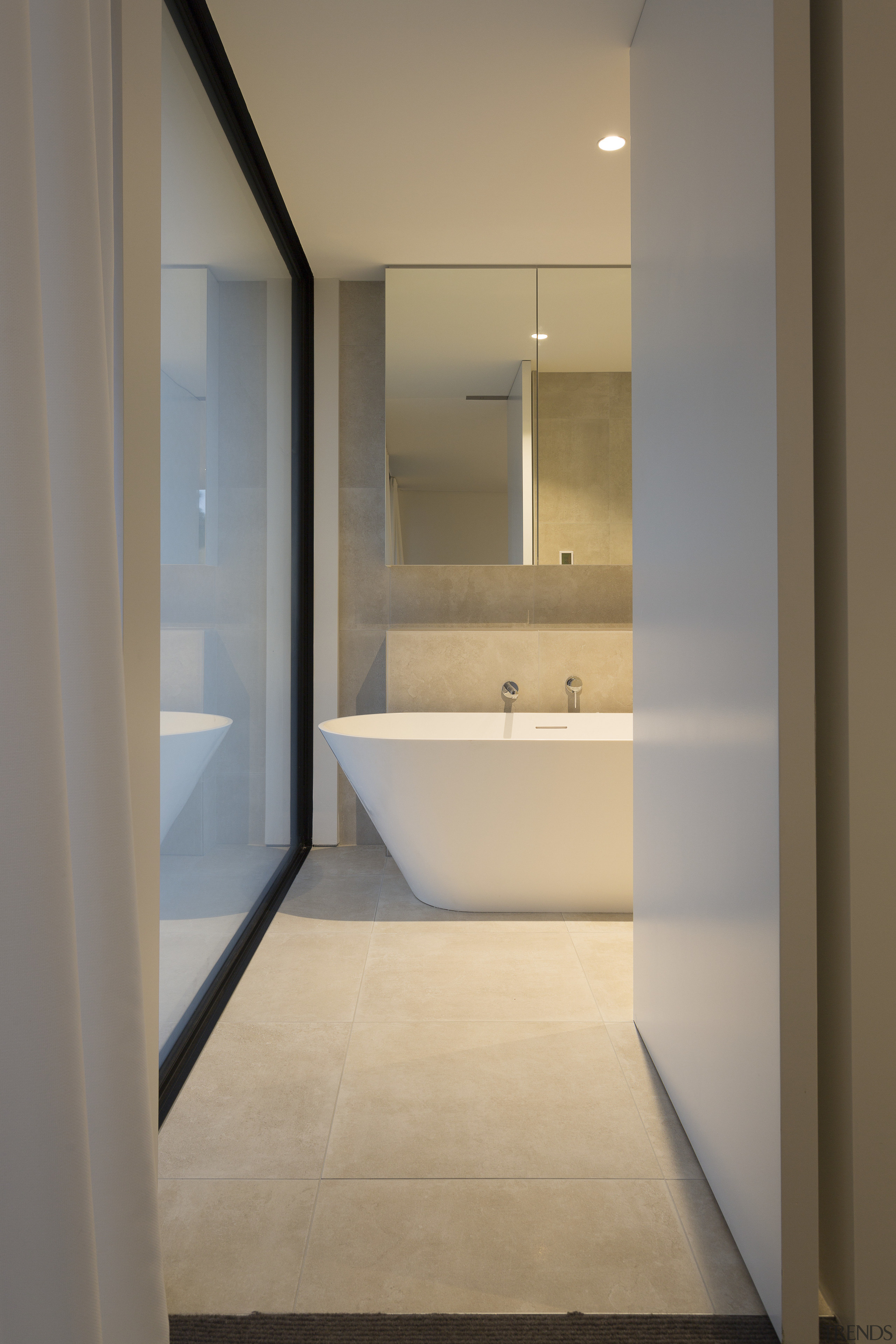 Despite this homes relatively close neighbourhood environment, the architecture, bathroom, daylighting, floor, home, house, interior design, property, real estate, room, sink, gray, brown