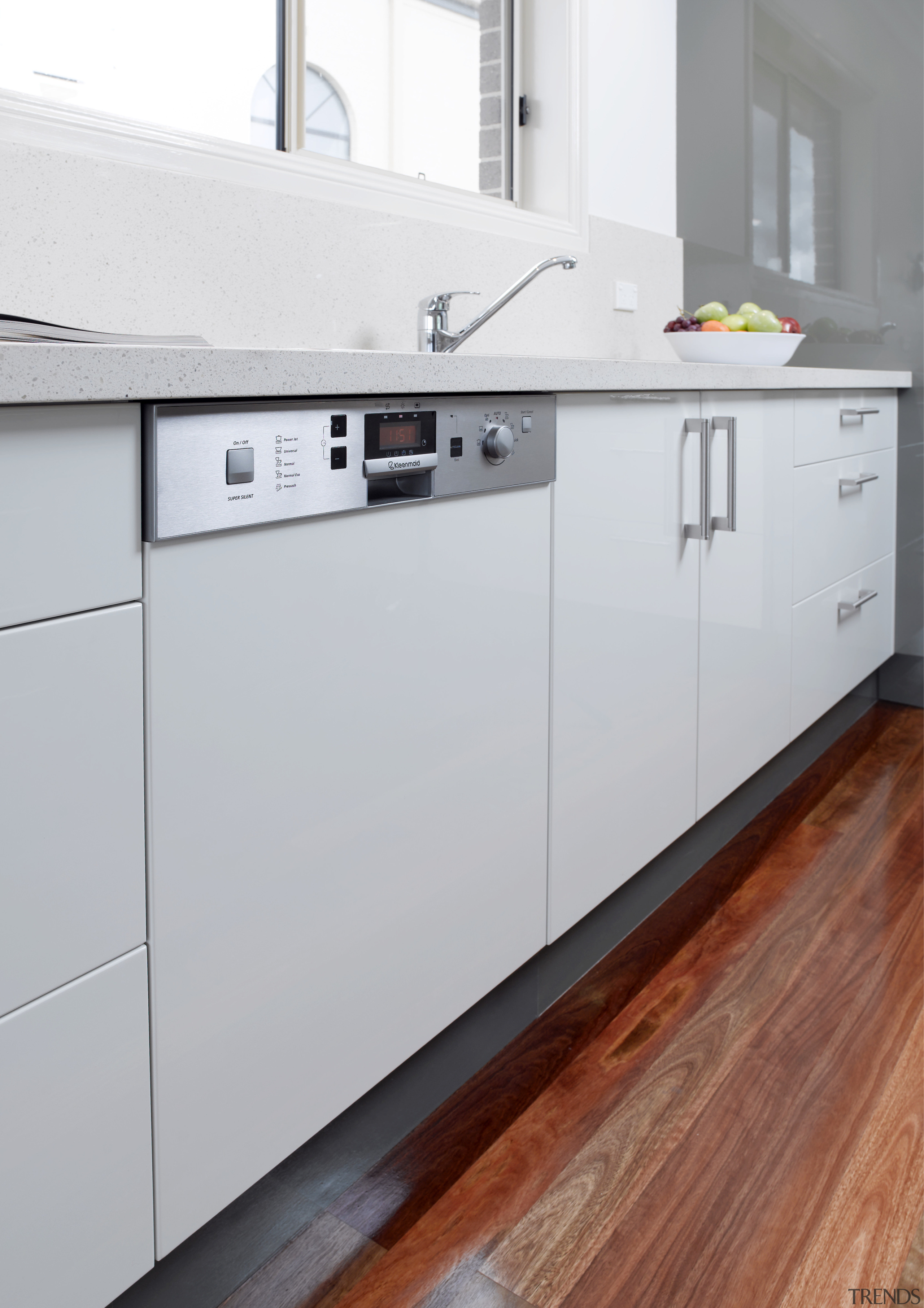 The semi-intergrated dishwasher is whisper quiet. - The cabinetry, countertop, floor, hardwood, home appliance, kitchen, kitchen appliance, kitchen stove, major appliance, product, gray
