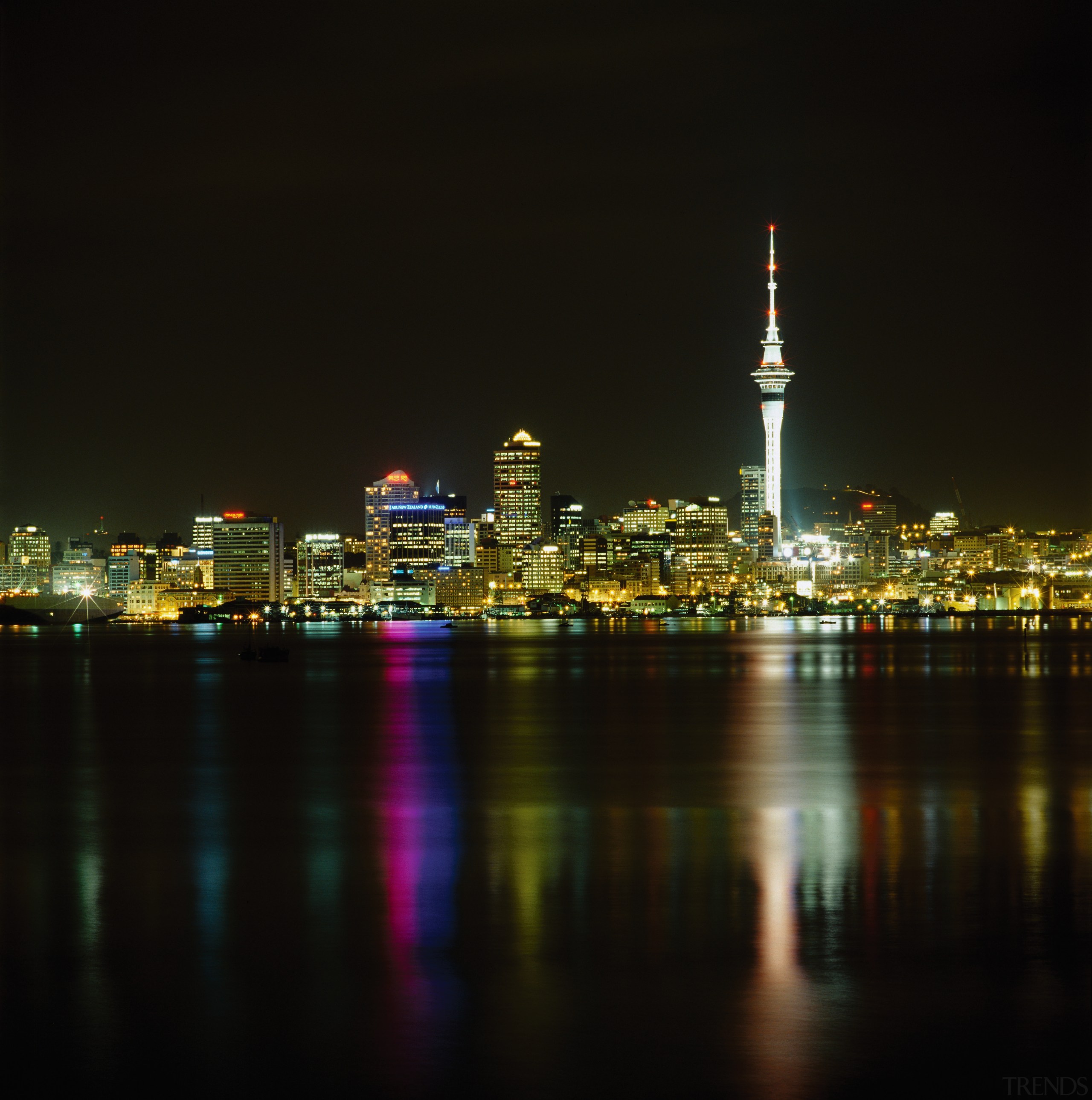 A view of an apartment complex developed by city, cityscape, darkness, daytime, downtown, evening, landmark, lighting, metropolis, metropolitan area, night, reflection, sky, skyline, skyscraper, tourist attraction, tower, tower block, urban area, water, black