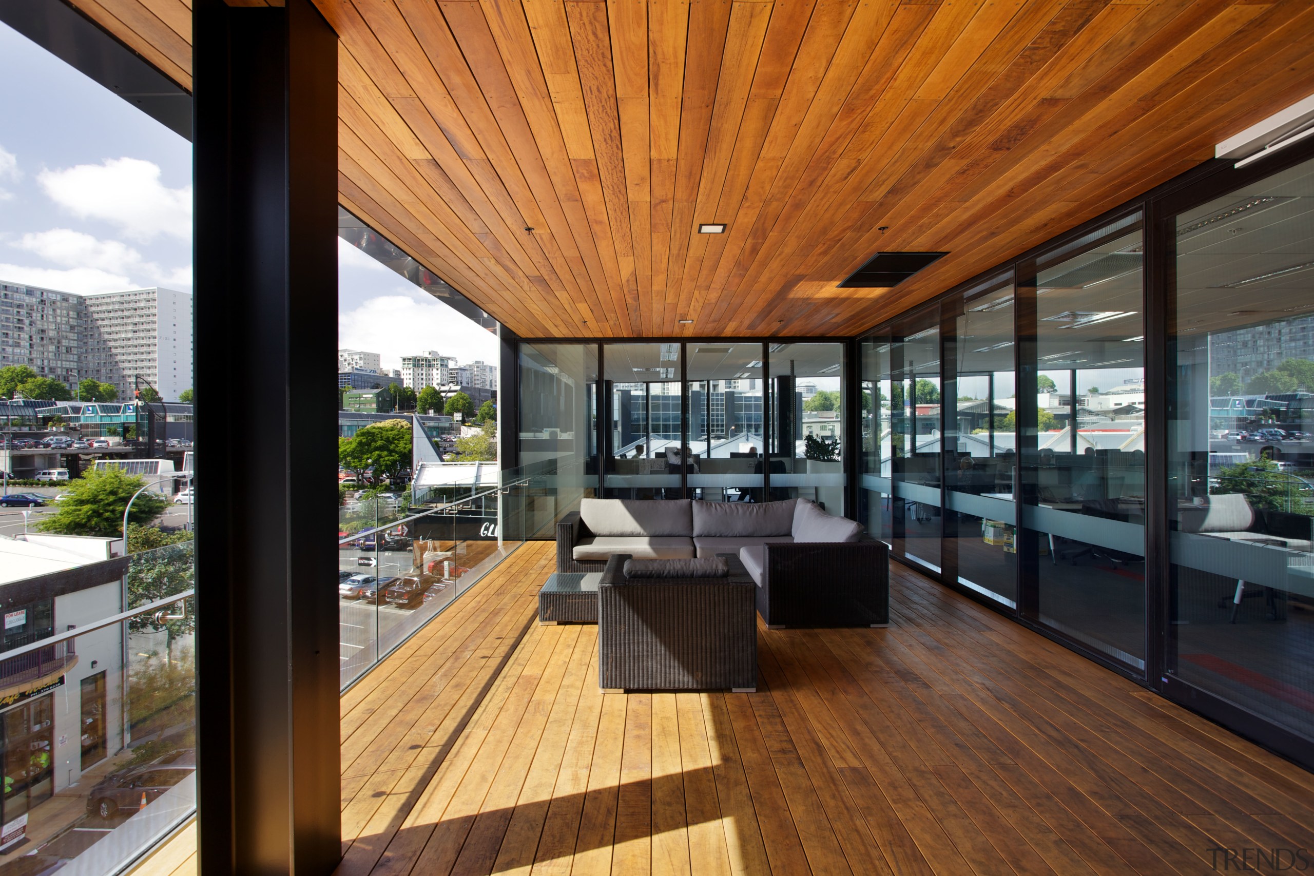 The new Ricoh office in Auckland features an apartment, architecture, balcony, daylighting, deck, home, house, interior design, penthouse apartment, real estate, roof, window, wood, brown, black