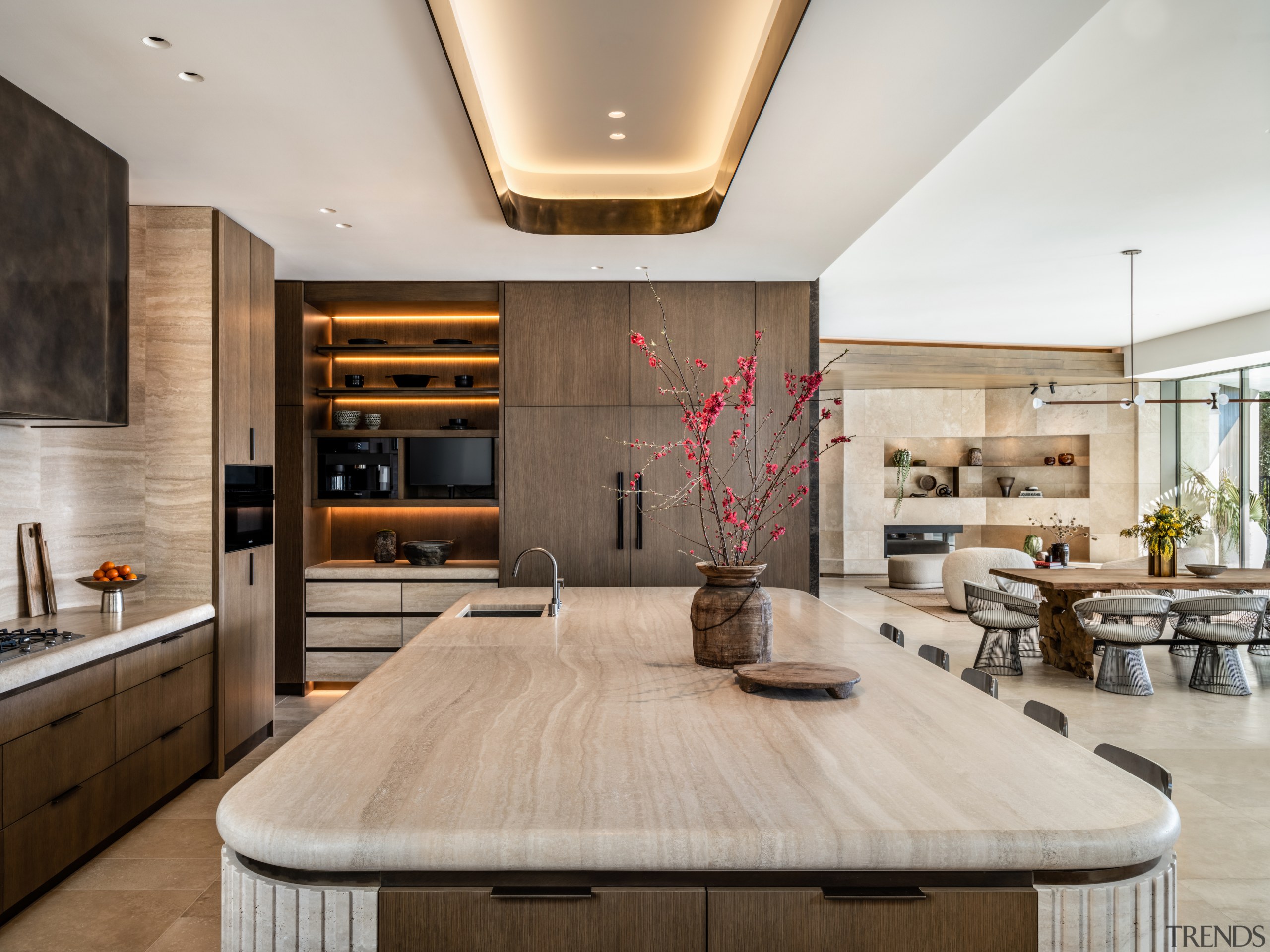 Contemporary kitchen with fluted finish on island. 