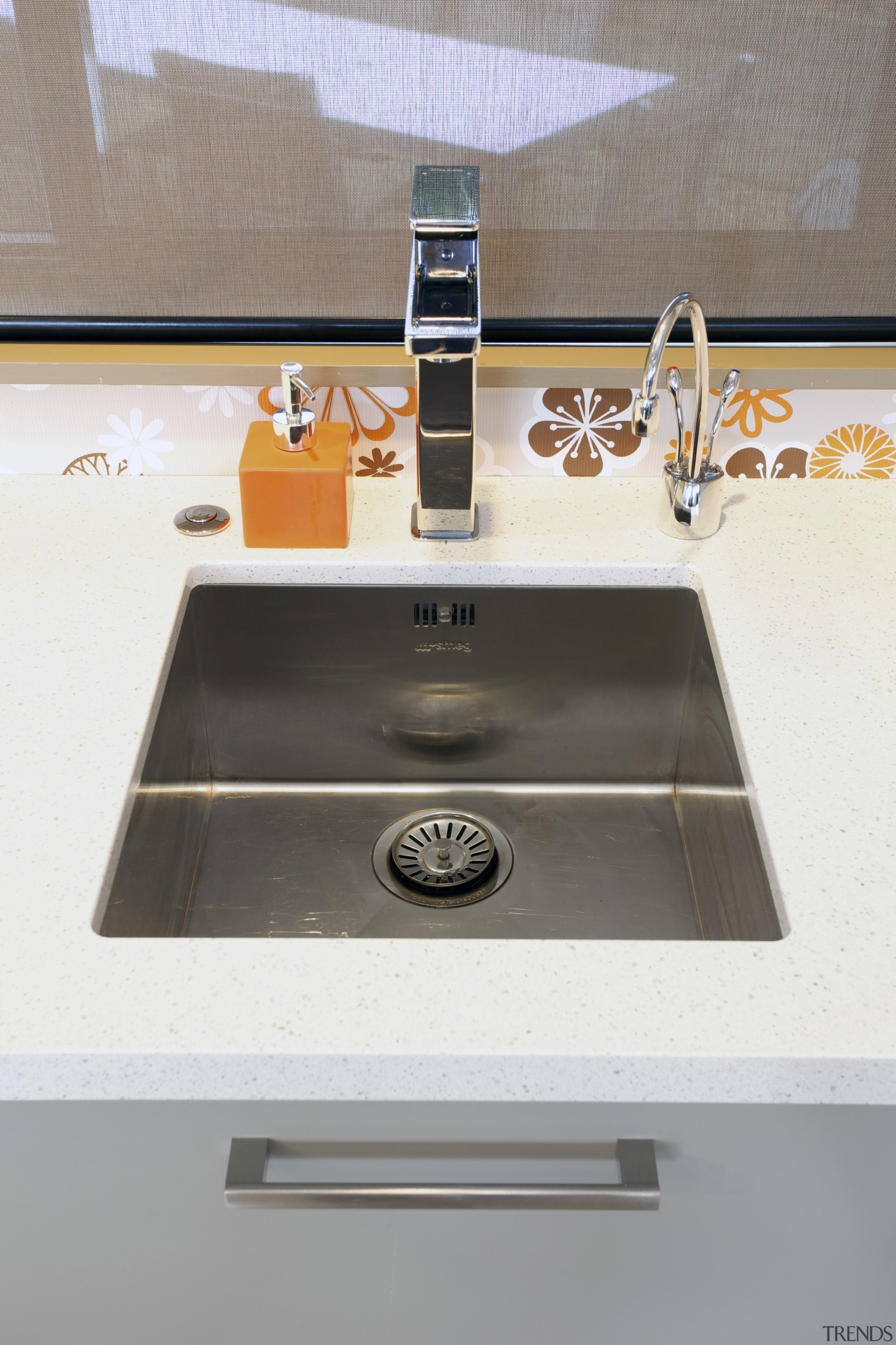 This new kitchen designed by Colleen Holder features bathroom sink, ceramic, countertop, plumbing fixture, product design, sink, tap, white, gray
