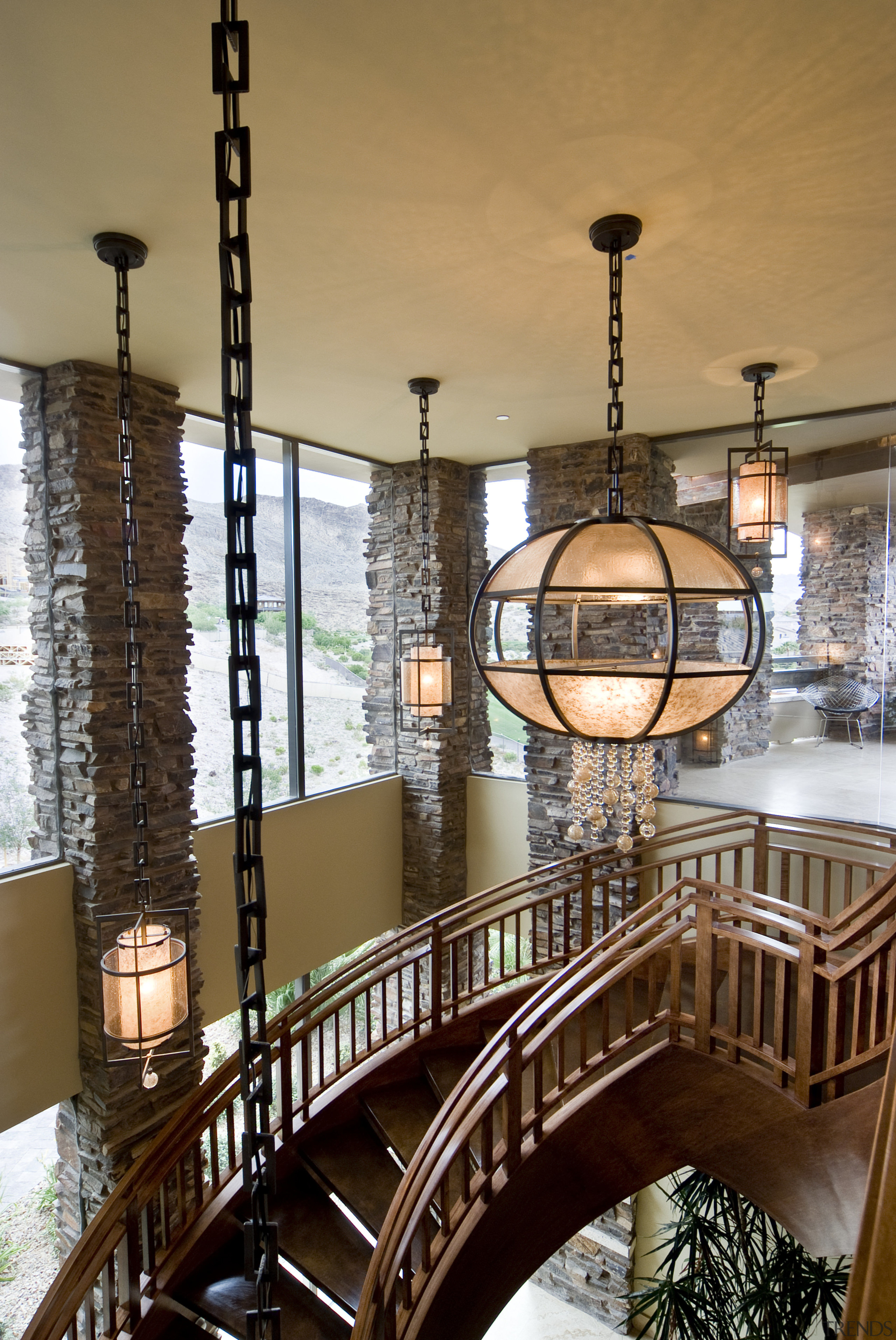 View of stairway which features chandelier hanging overhead architecture, chandelier, furniture, interior design, iron, light fixture, lighting, tourist attraction, wood, brown