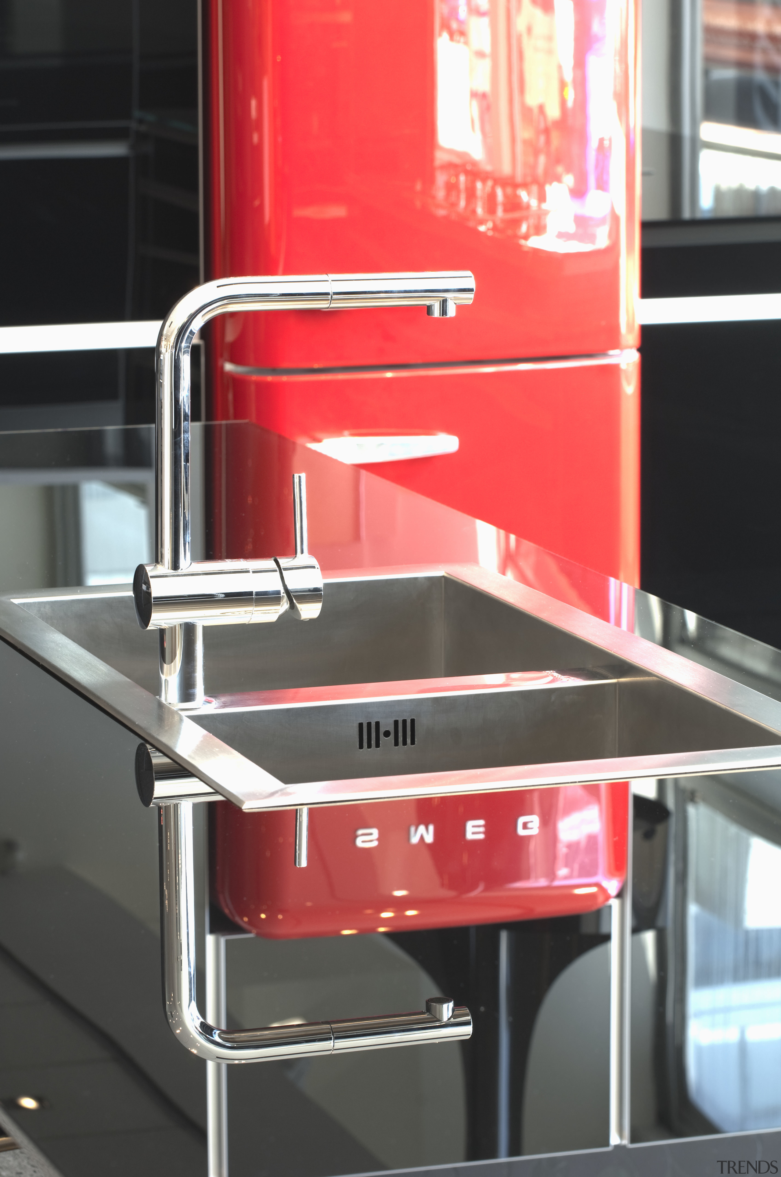 View of kitchen which features a Smeg 50s kitchen appliance, product design, black, red