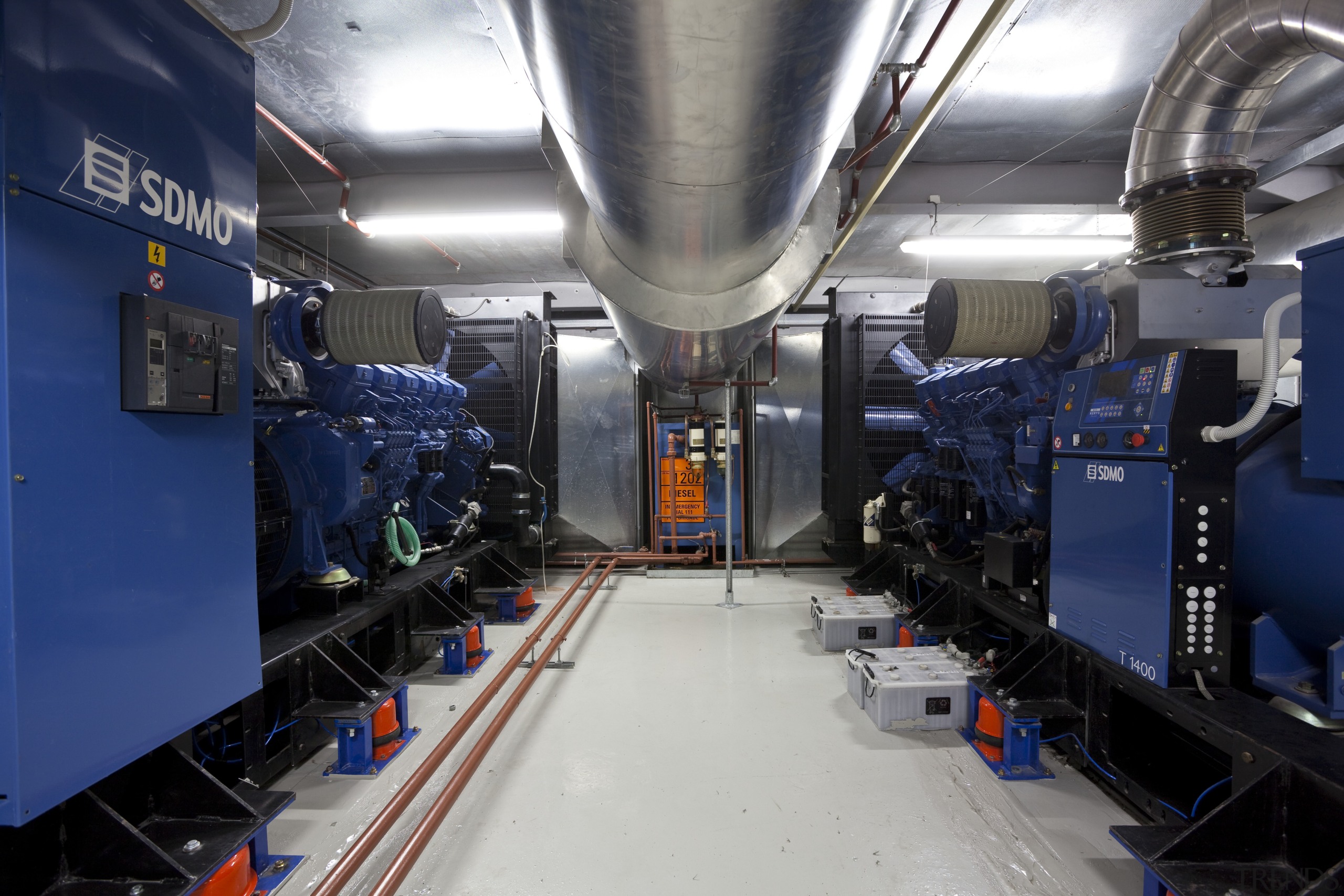 View of Britomart East project, for which Norman auto part, automotive engine part, engine, engineering, factory, industry, locomotive, manufacturing, motor vehicle, passenger, public transport, rapid transit, train, transport, blue, gray