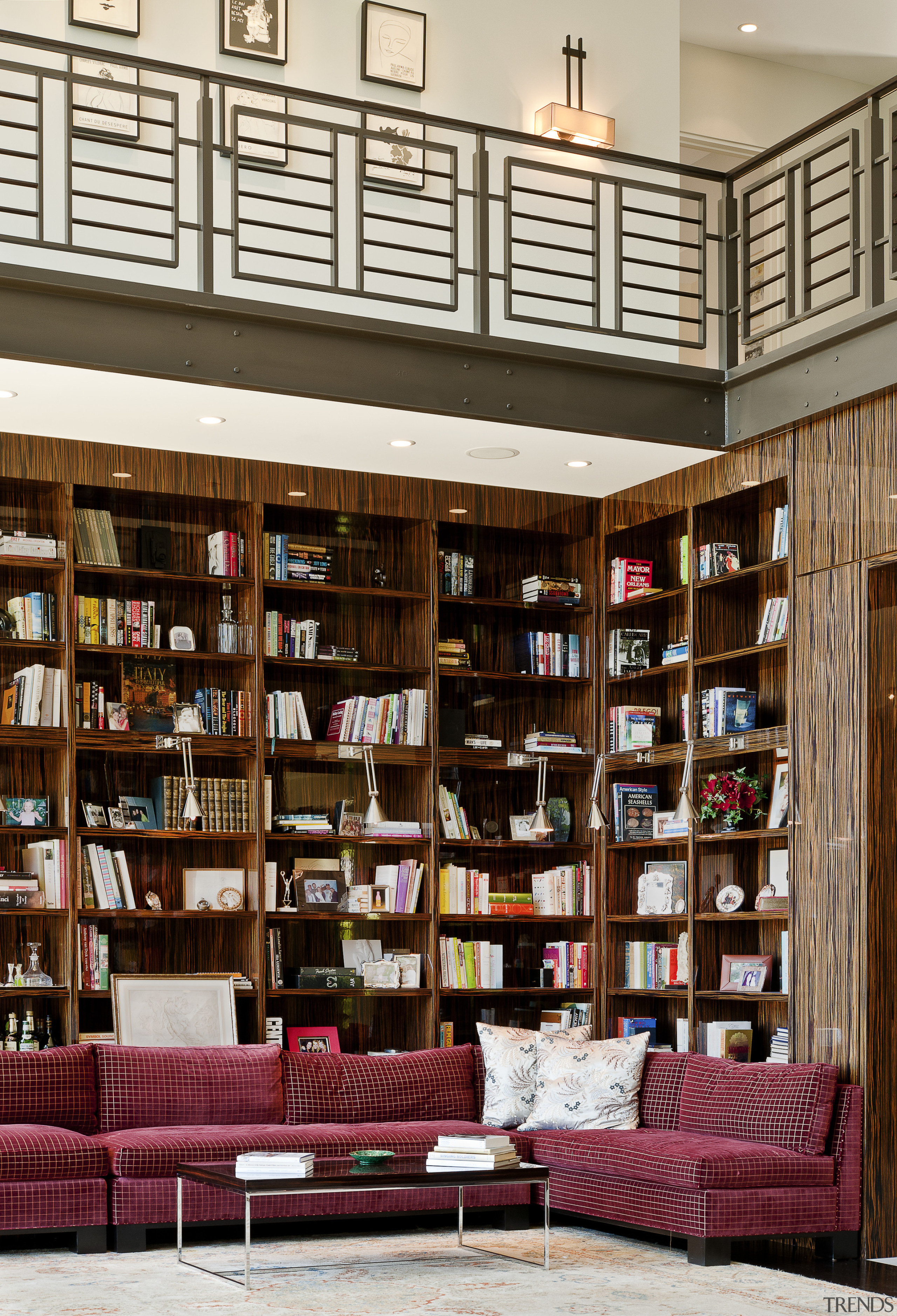 View of the library that features shelving and bookcase, bookselling, furniture, institution, interior design, library, library science, public library, shelf, shelving, white, red