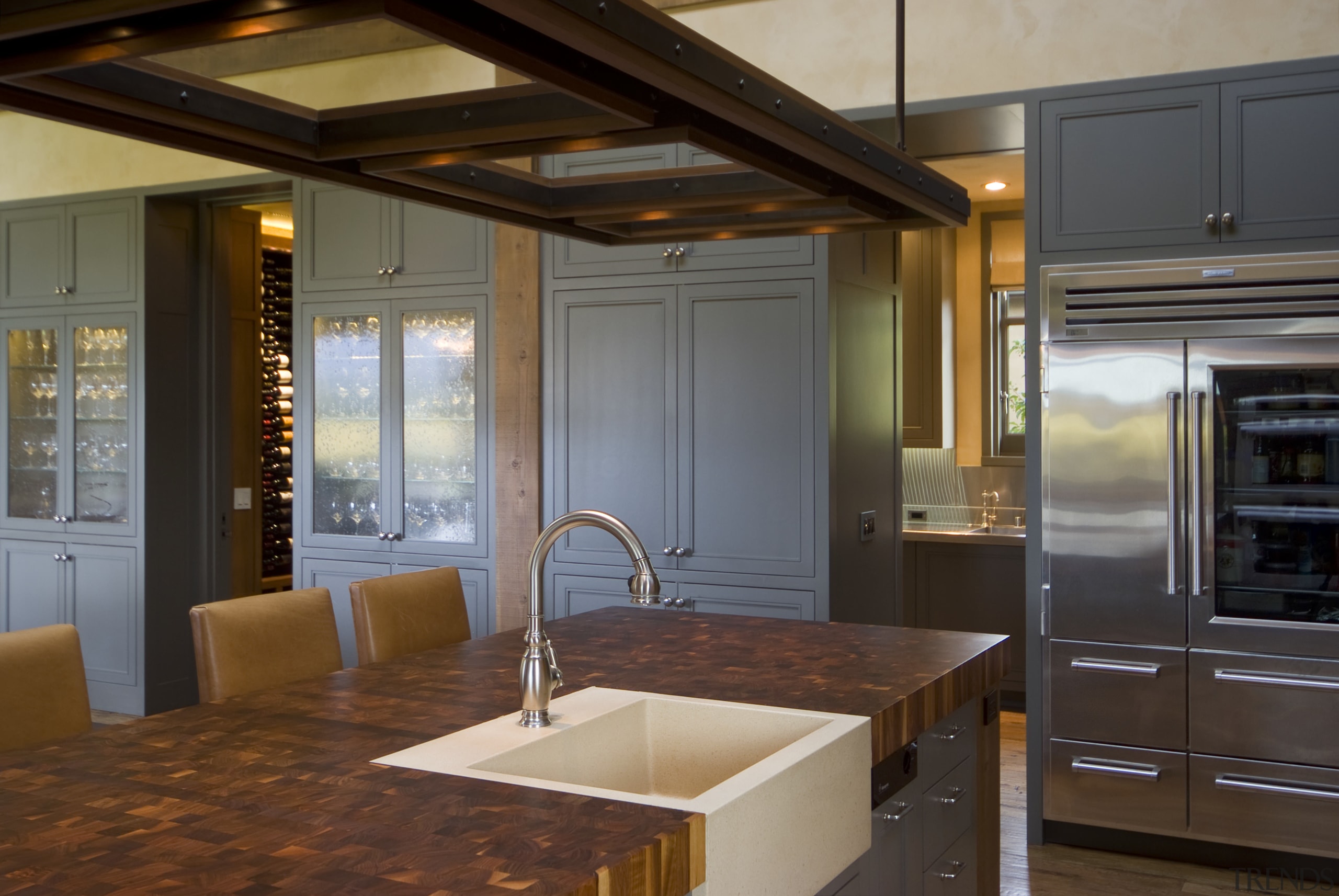 View of kitchen, great room and wine cellar. cabinetry, countertop, interior design, kitchen, room, brown, gray