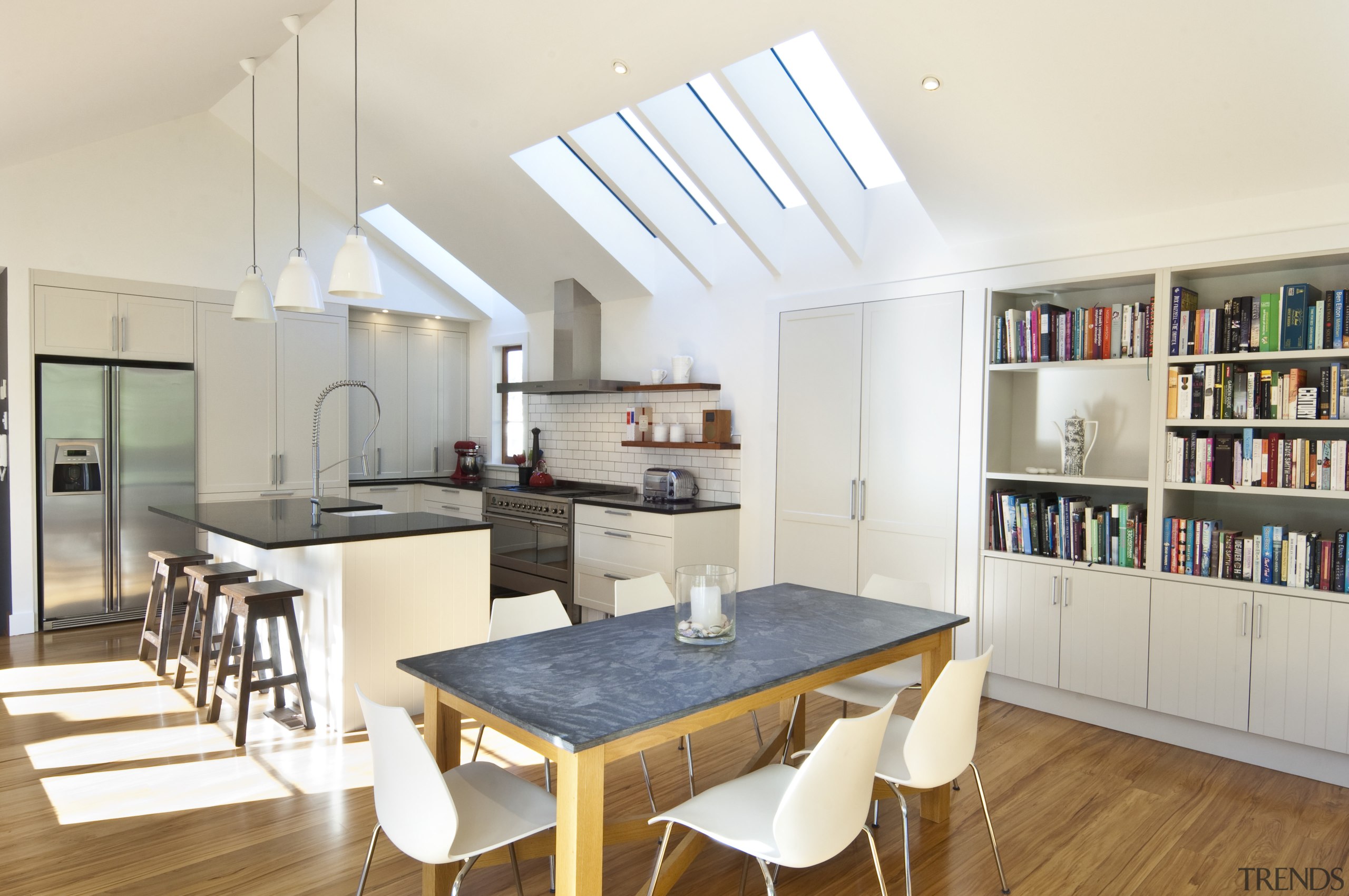 View of renovated kitchen which features timber floors, dining room, interior design, kitchen, real estate, room, table, white