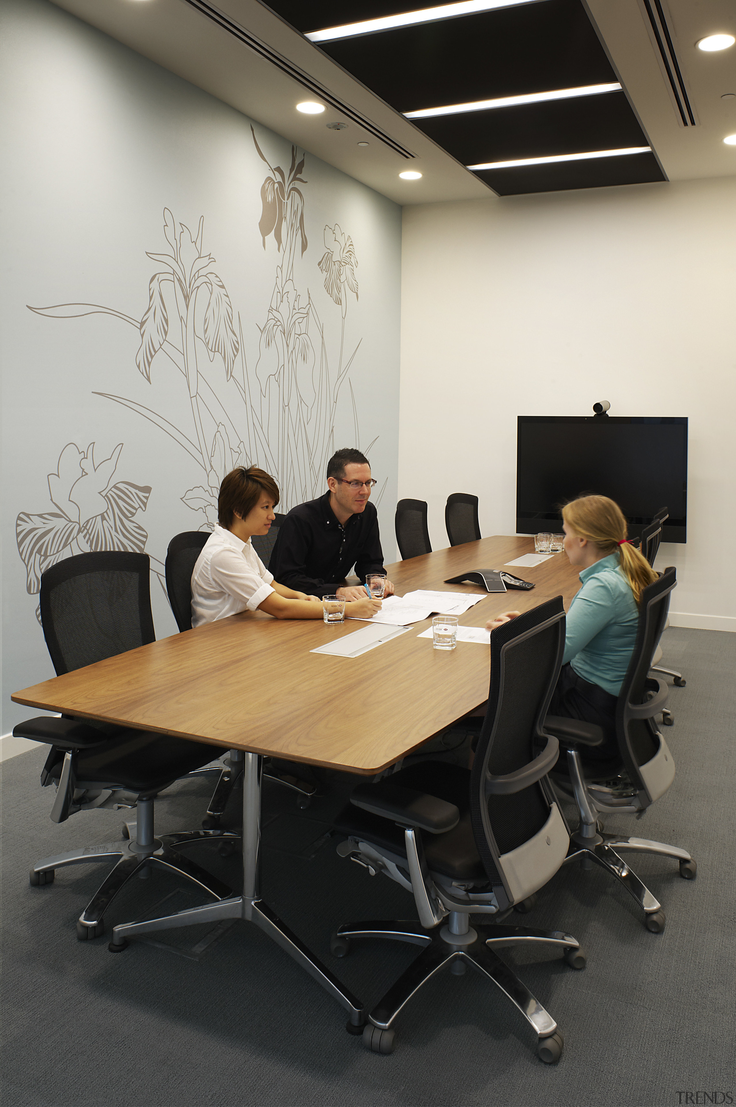 View of the sustainable HSBC office in Mapletree chair, conference hall, desk, furniture, interior design, office, office chair, product design, table, black