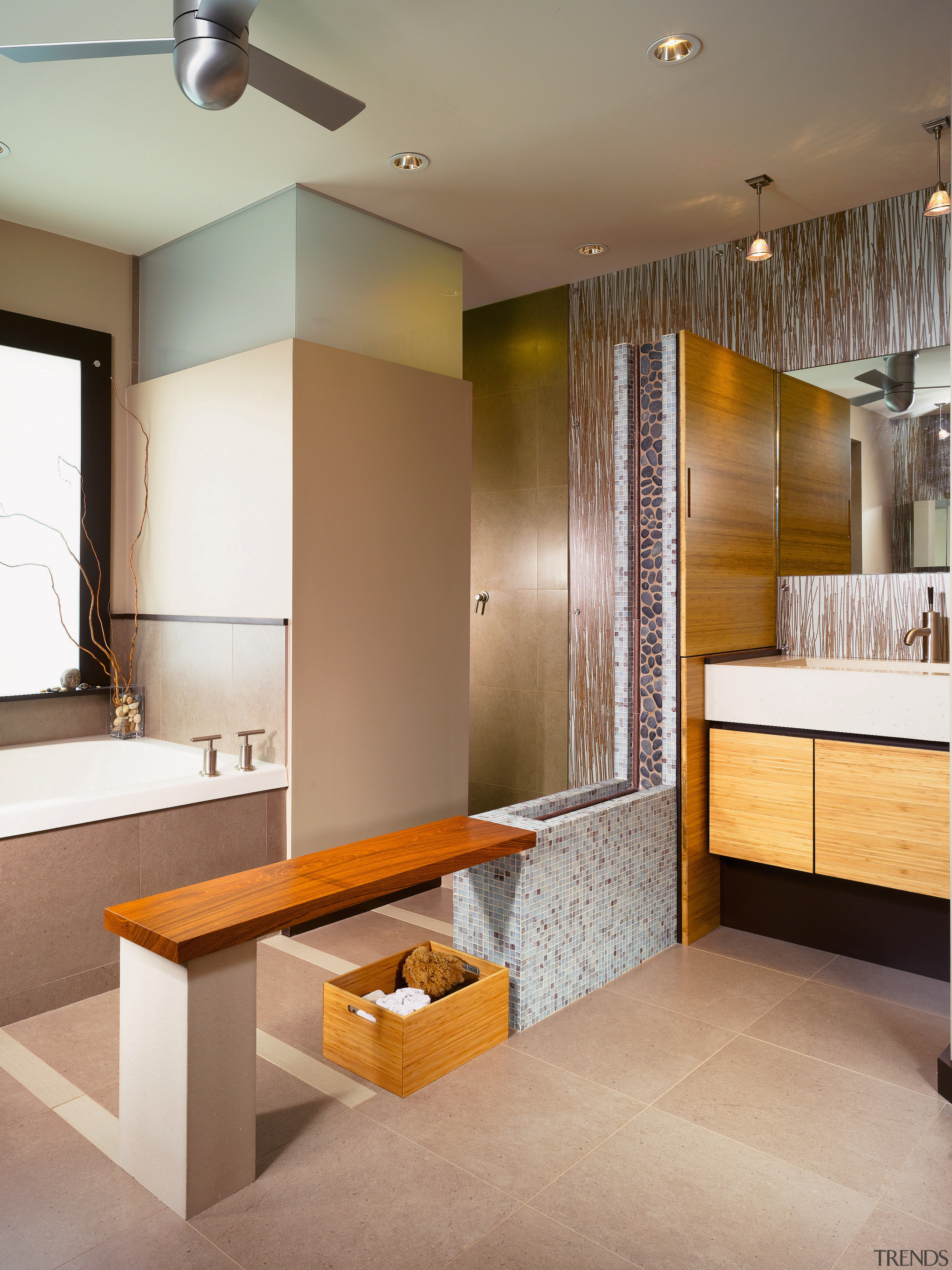 This master bathroom  features river rocks which bathroom, floor, flooring, home, interior design, room, sink, brown