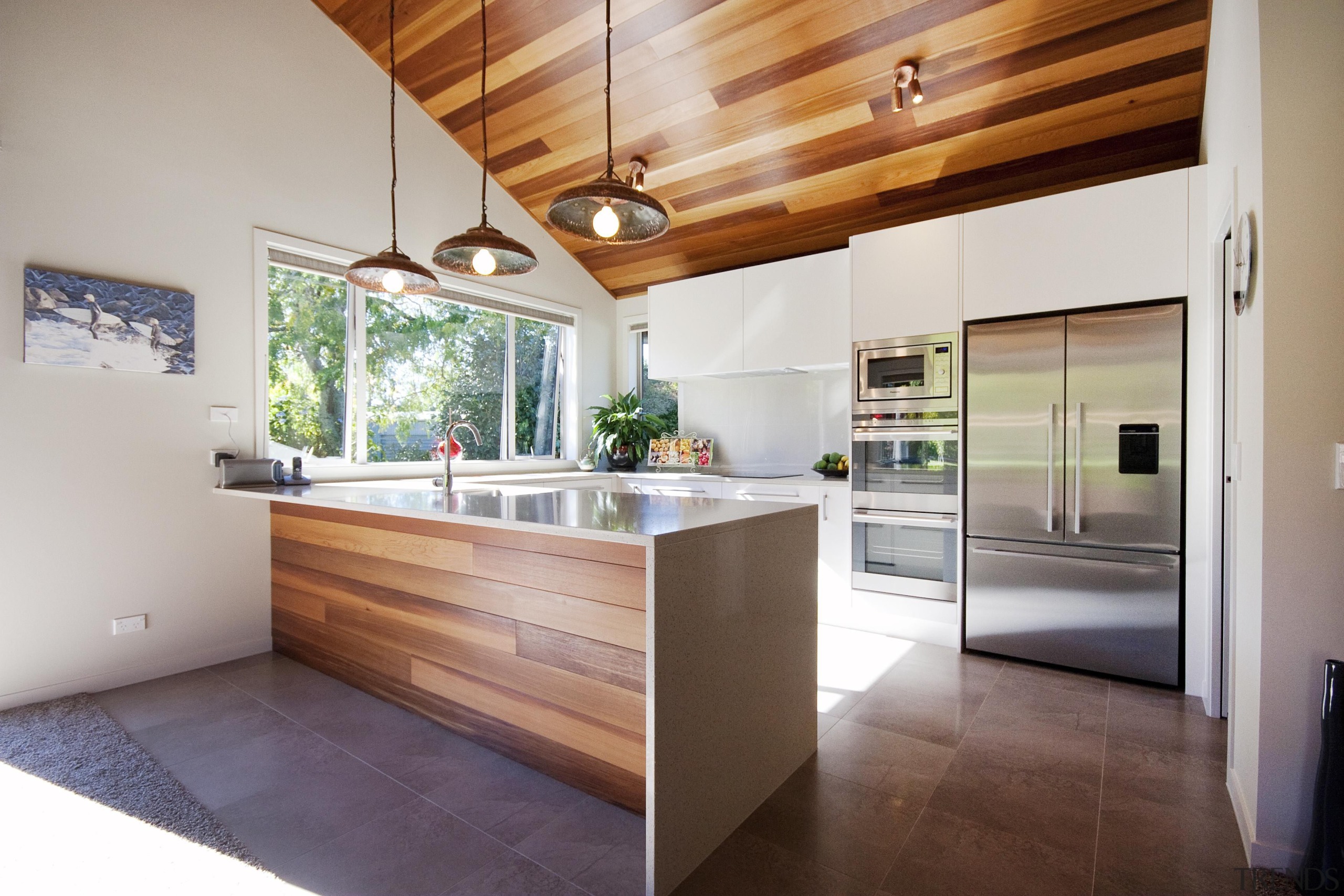 This home built by Fowler Homes Taranaki features architecture, countertop, cuisine classique, house, interior design, kitchen, property, real estate, gray