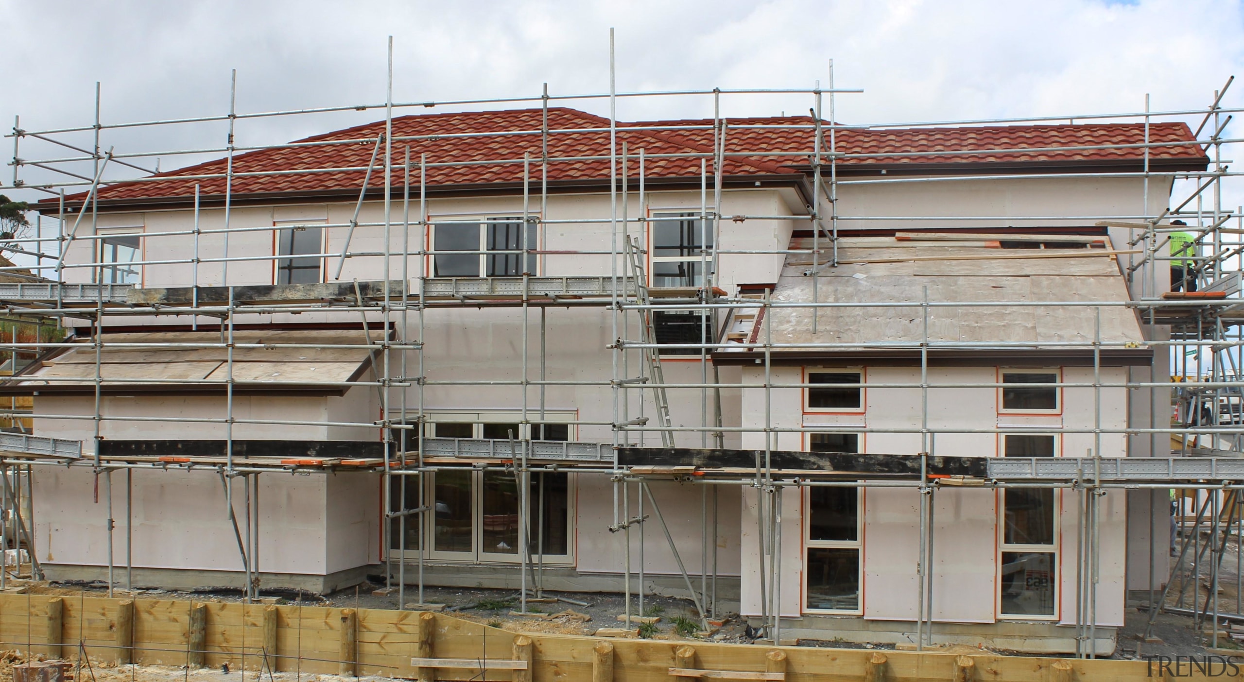 Metrotile Roof 2 - apartment | building | apartment, building, condominium, construction, facade, real estate, residential area, roof, scaffolding, gray