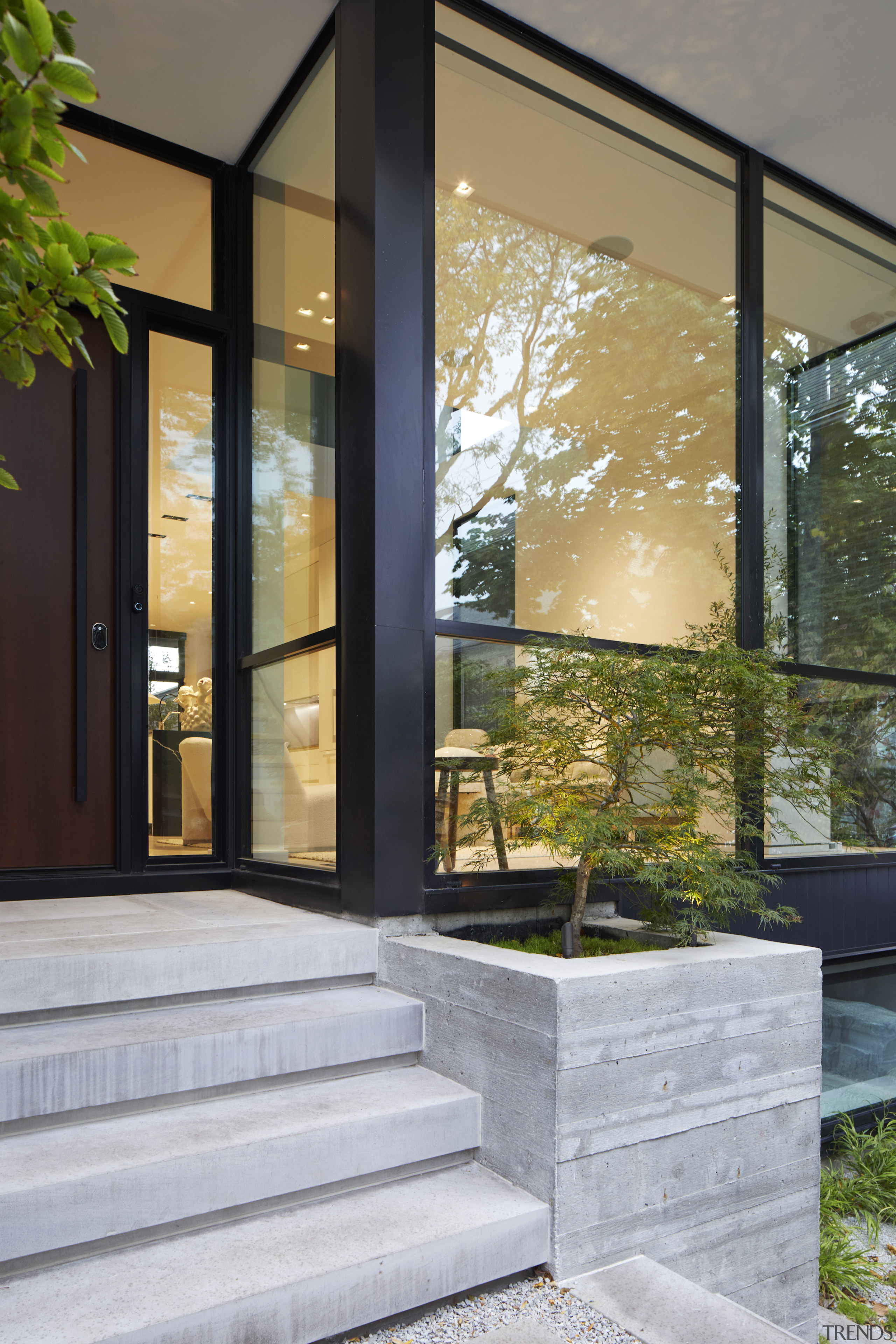 A concrete planter box forms part of the 