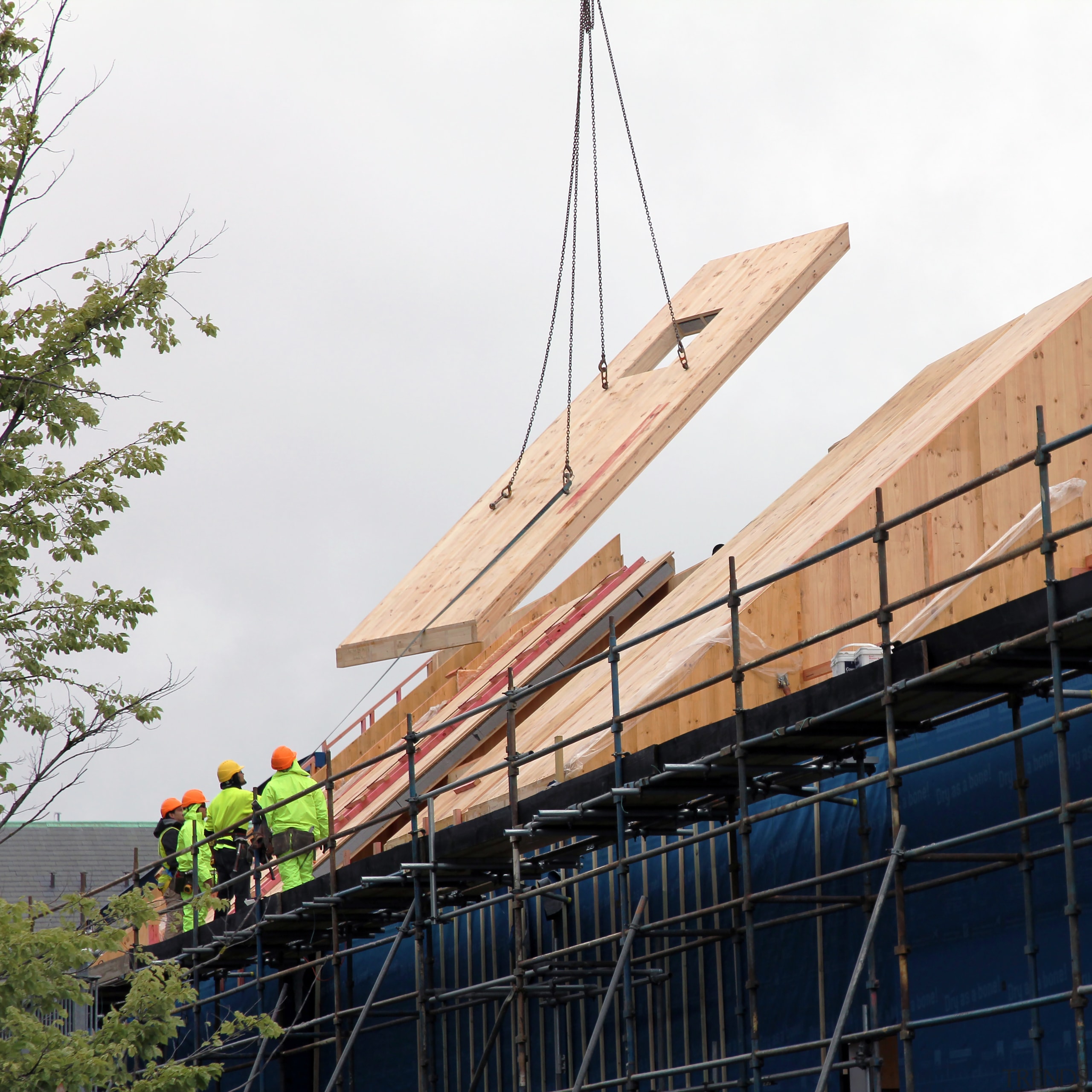 Below:Designed by architects Warren and Mahoney, this apartment architecture, building, roof, sky, wood, white