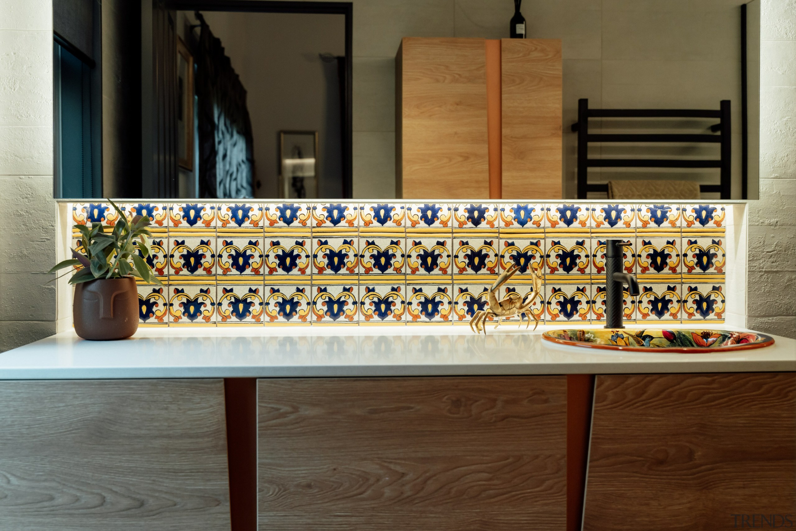 The feature tiles make for a vibrant splashback. 