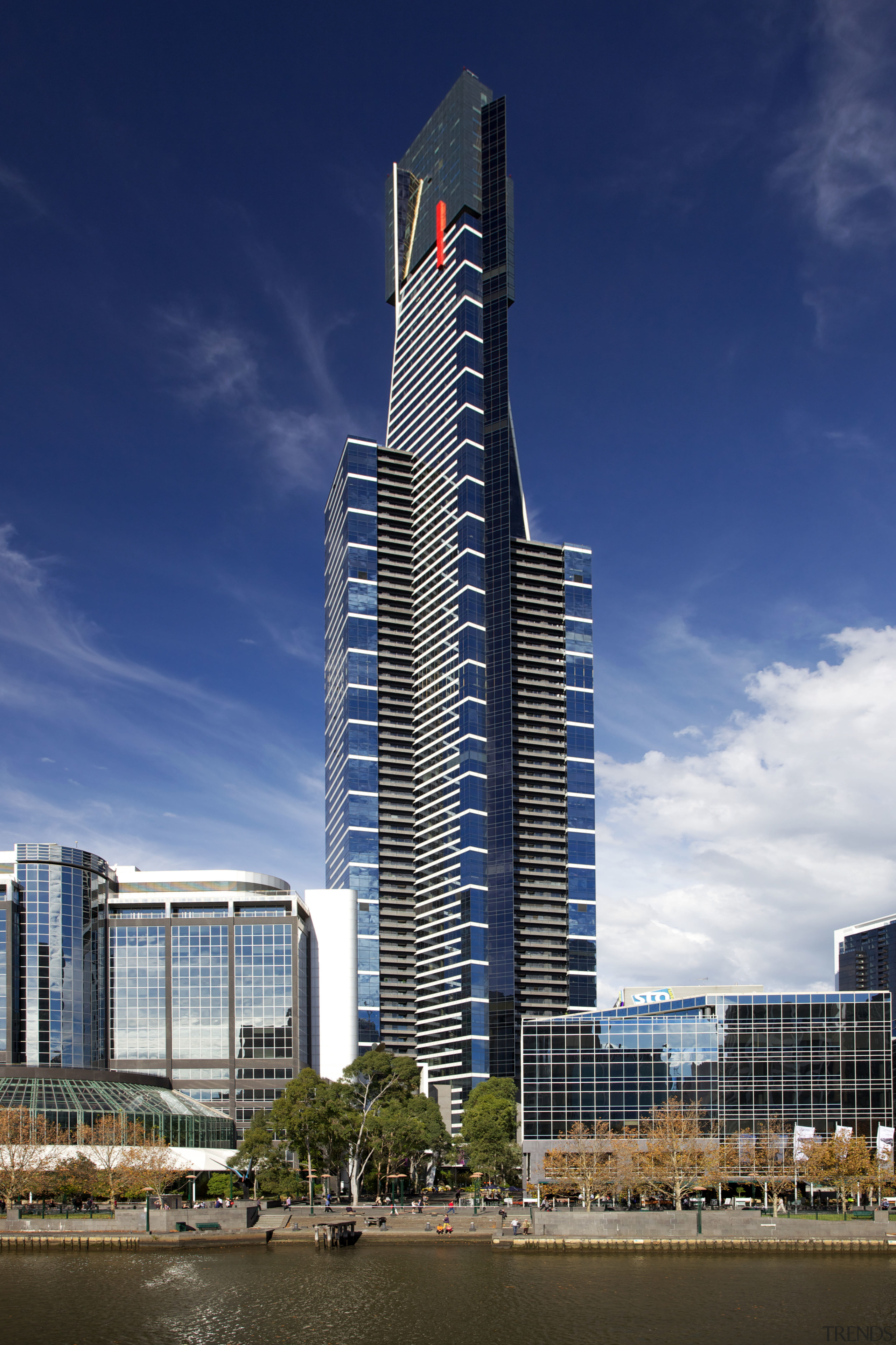 The Eureka Tower in  Melbourne overlooks the architecture, building, city, cityscape, commercial building, condominium, corporate headquarters, daytime, headquarters, landmark, metropolis, metropolitan area, mixed use, reflection, sky, skyline, skyscraper, tower, tower block, urban area, water, blue