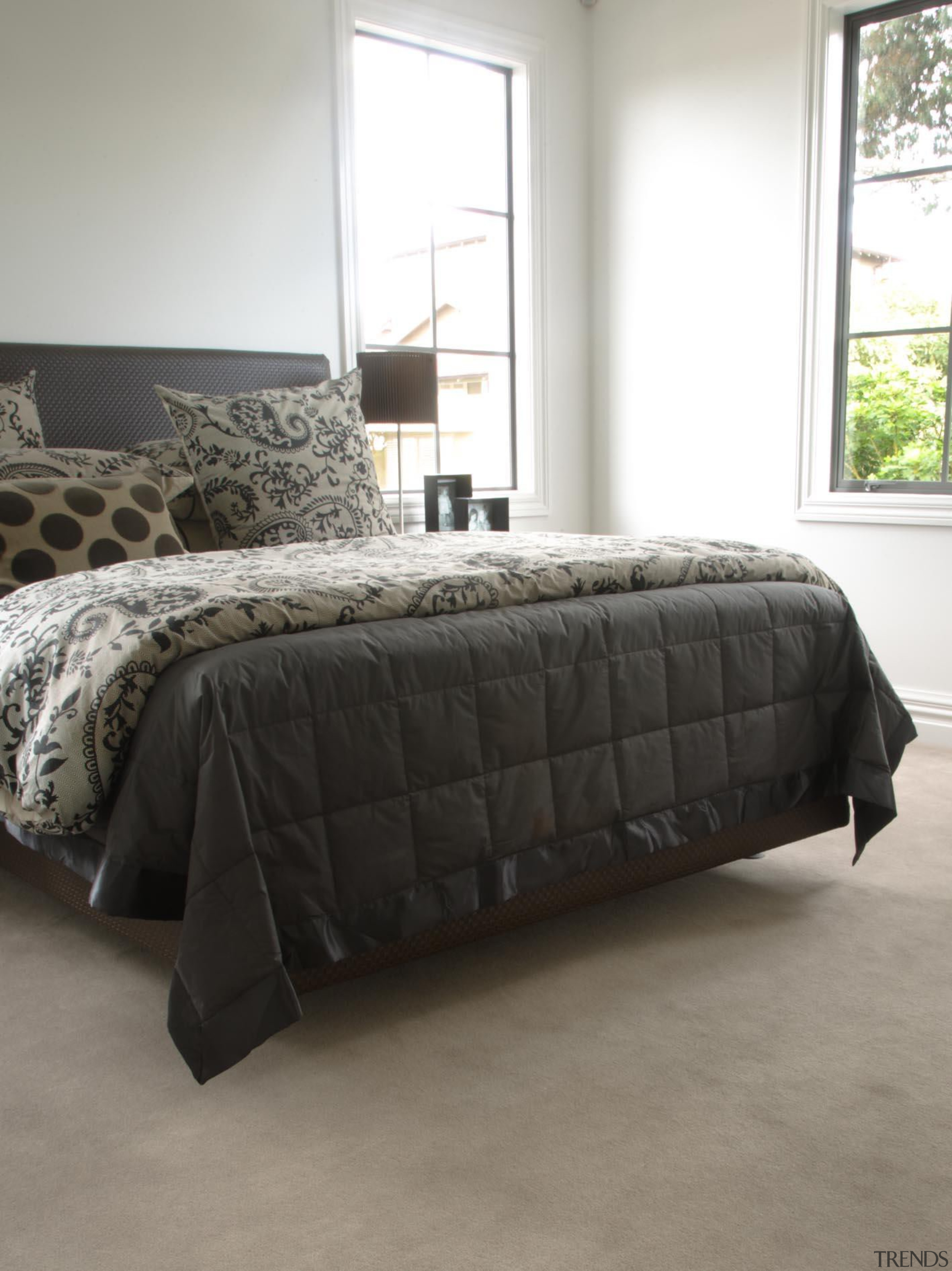 This luxurious plush pile carpet will enrich the bed, bed frame, bed sheet, bedroom, couch, duvet cover, floor, flooring, furniture, home, mattress, sofa bed, gray, black