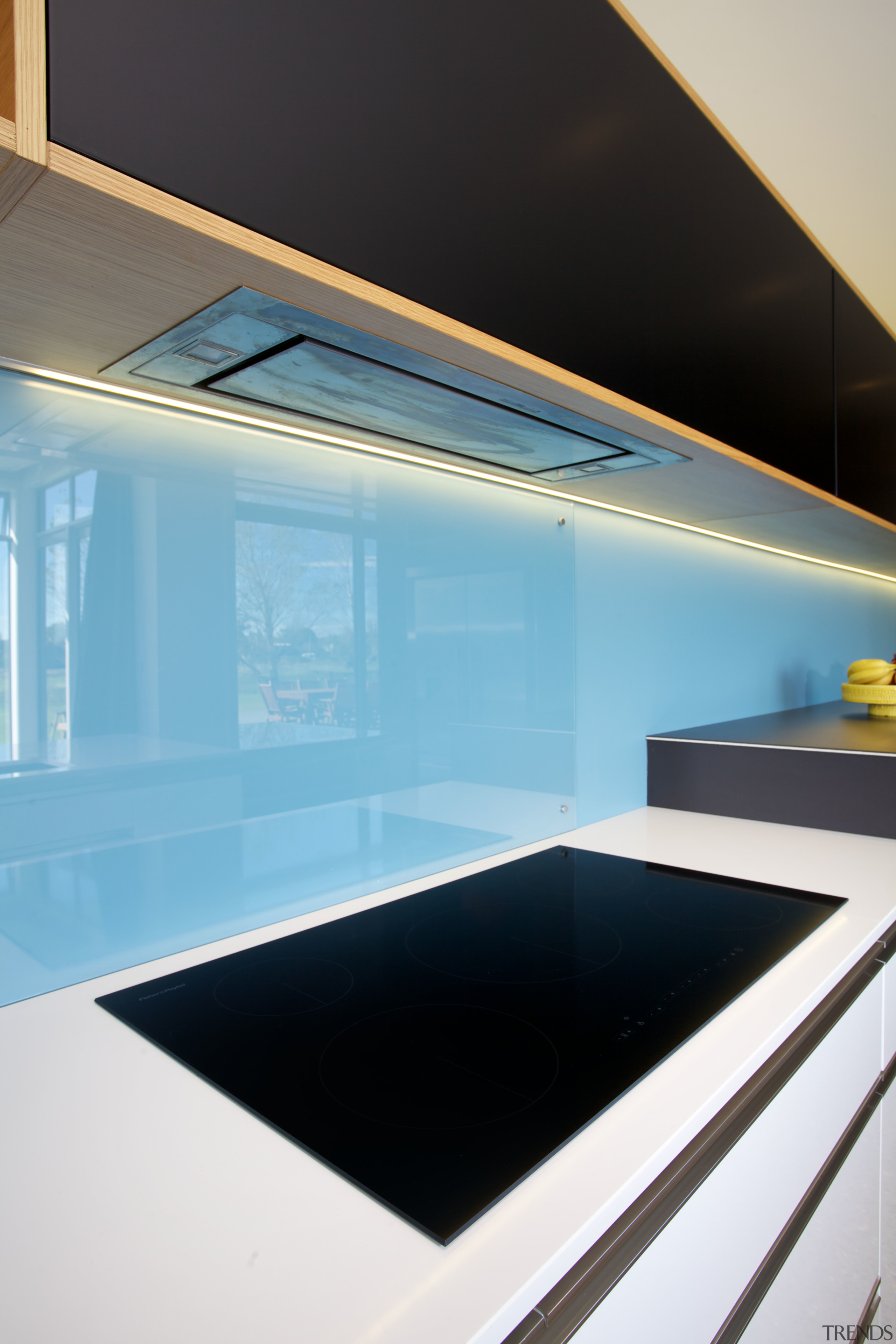 Modern kitchen with Fisher &amp; Paykel induction cooktop architecture, countertop, daylighting, glass, house, interior design, lighting, product design, black, teal, white