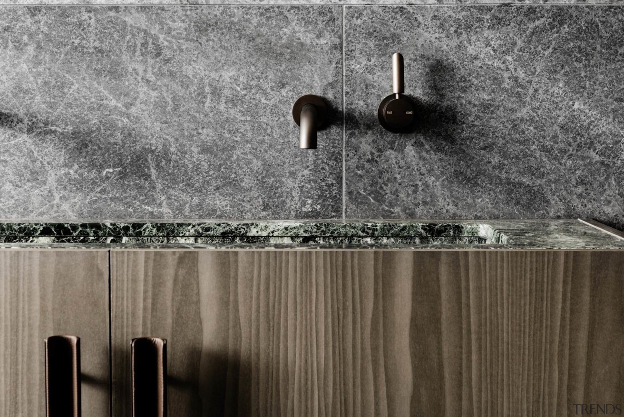 The bathroom fittings reflect those in the kitchen black and white, floor, flooring, texture, tile, wall, wood, gray, black