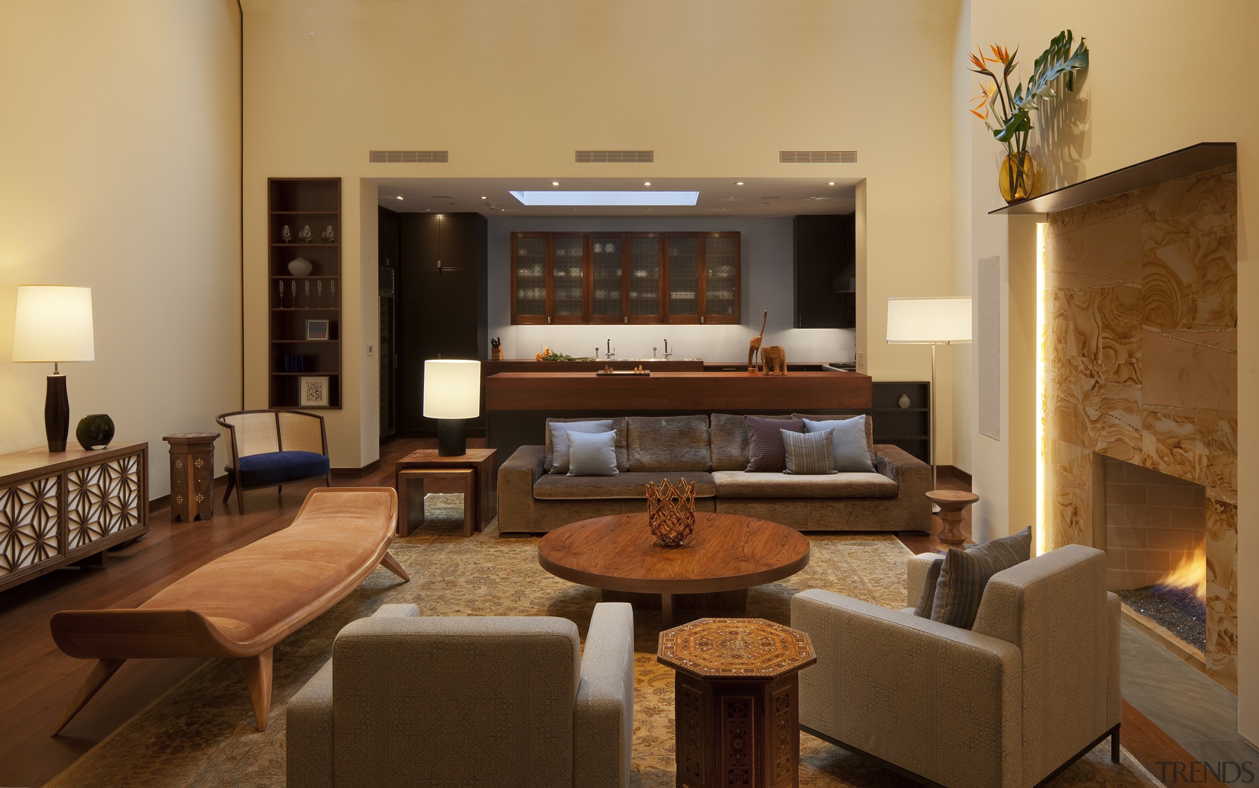 Lounge with grey seats and round table. - interior design, living room, lobby, real estate, room, suite, brown, orange