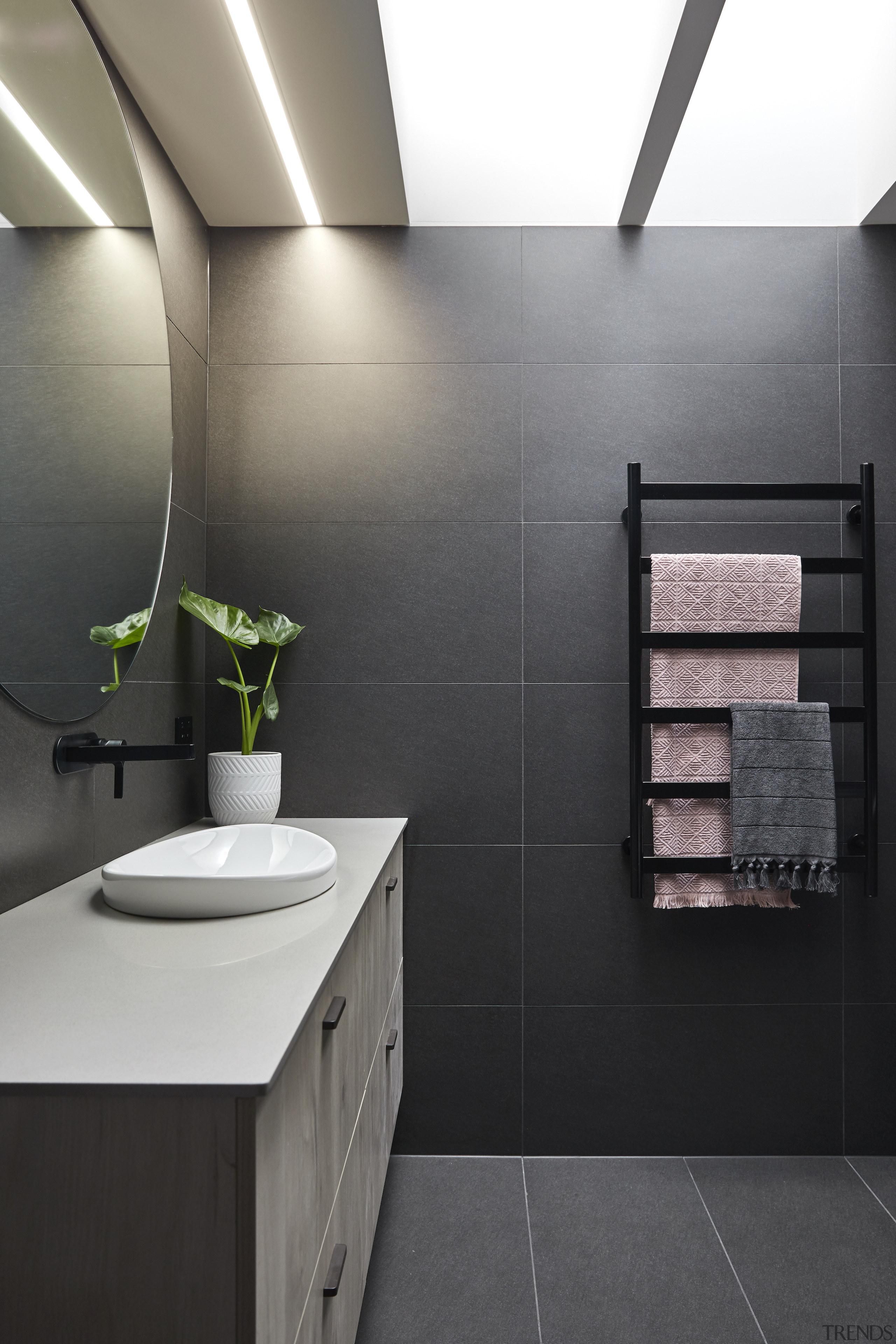 Skylights flood the bathroom with natural light. 