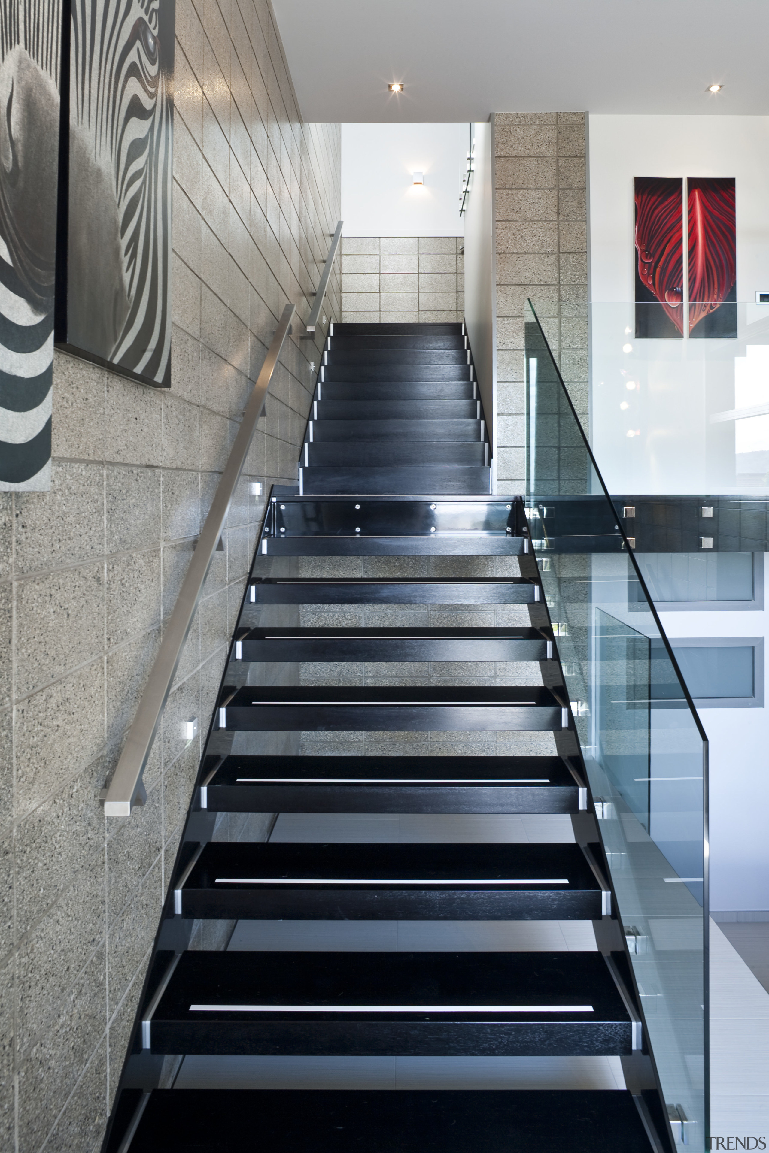 View of a stairway of a home built architecture, daylighting, floor, flooring, glass, handrail, interior design, stairs, structure, gray, black