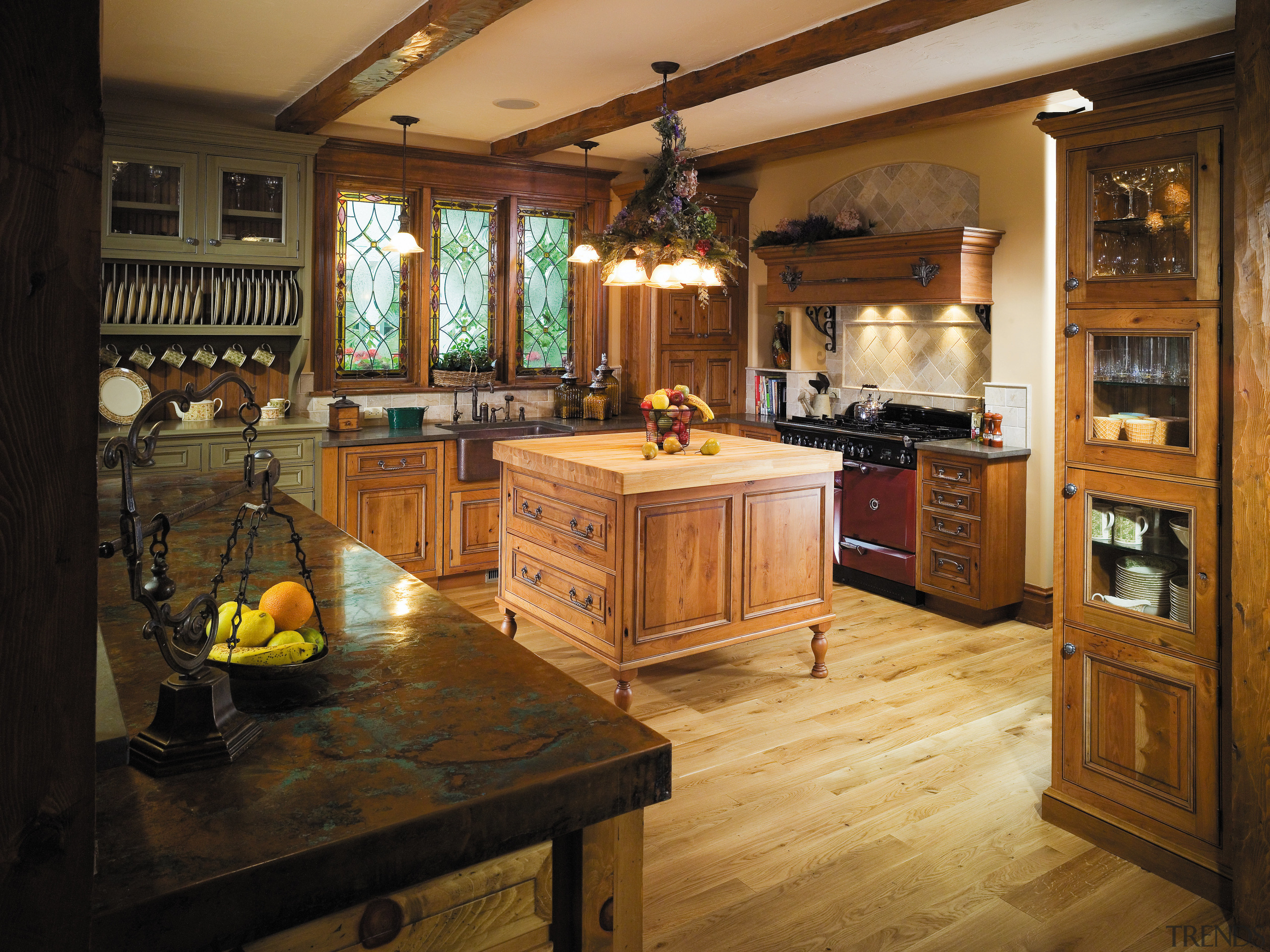 A view of the kitchen, wooden flooring and cabinetry, countertop, cuisine classique, flooring, interior design, kitchen, room, wood, brown, black