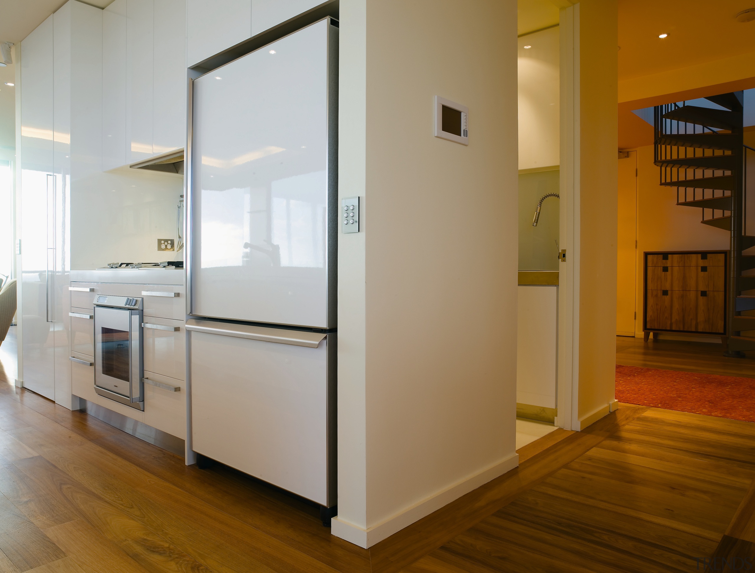 A view of the kitchen and dining area floor, flooring, hardwood, interior design, kitchen, real estate, room, wood flooring, brown, gray