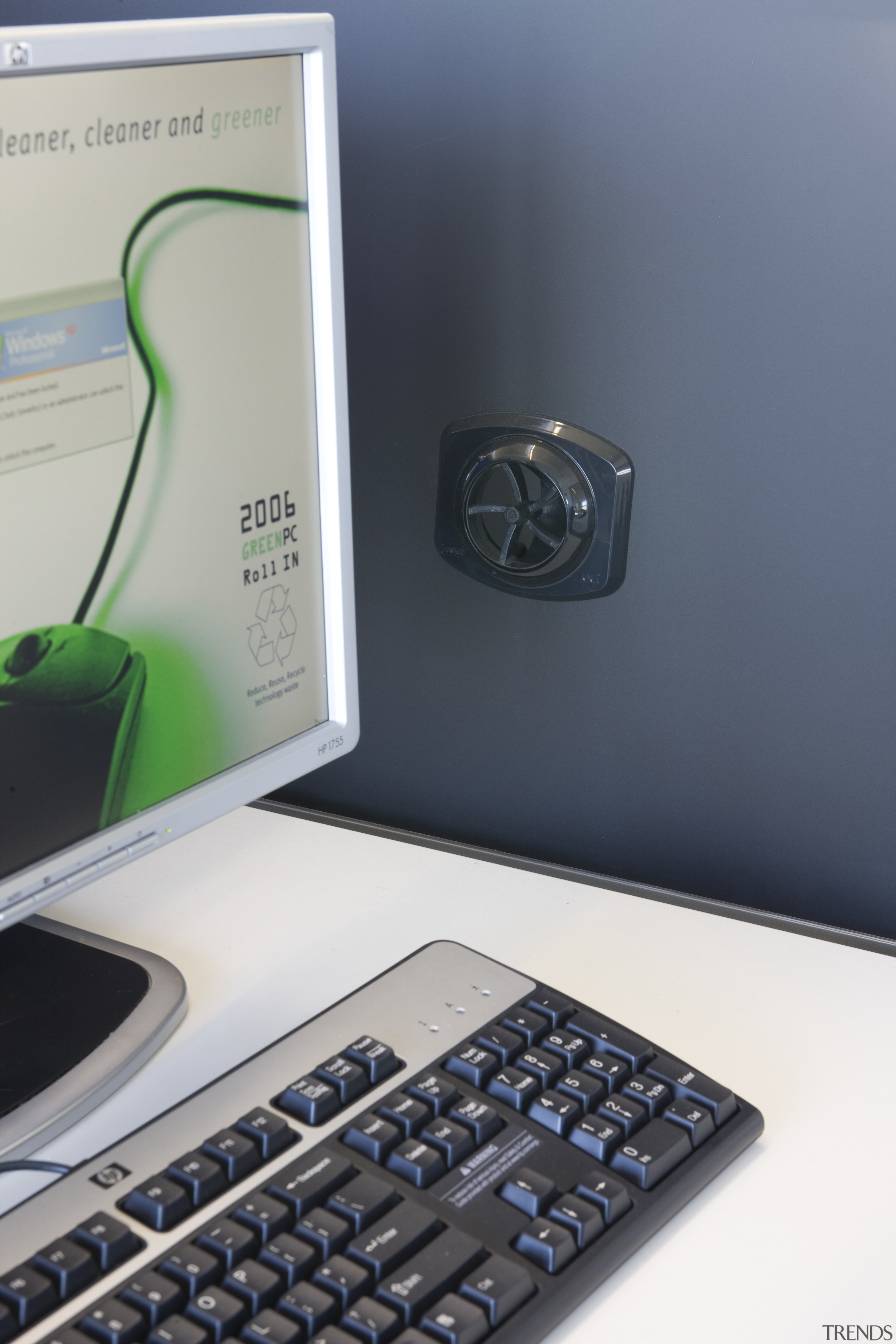 View of an office work station which features computer hardware, computer keyboard, electronic device, input device, product, product design, technology, gray