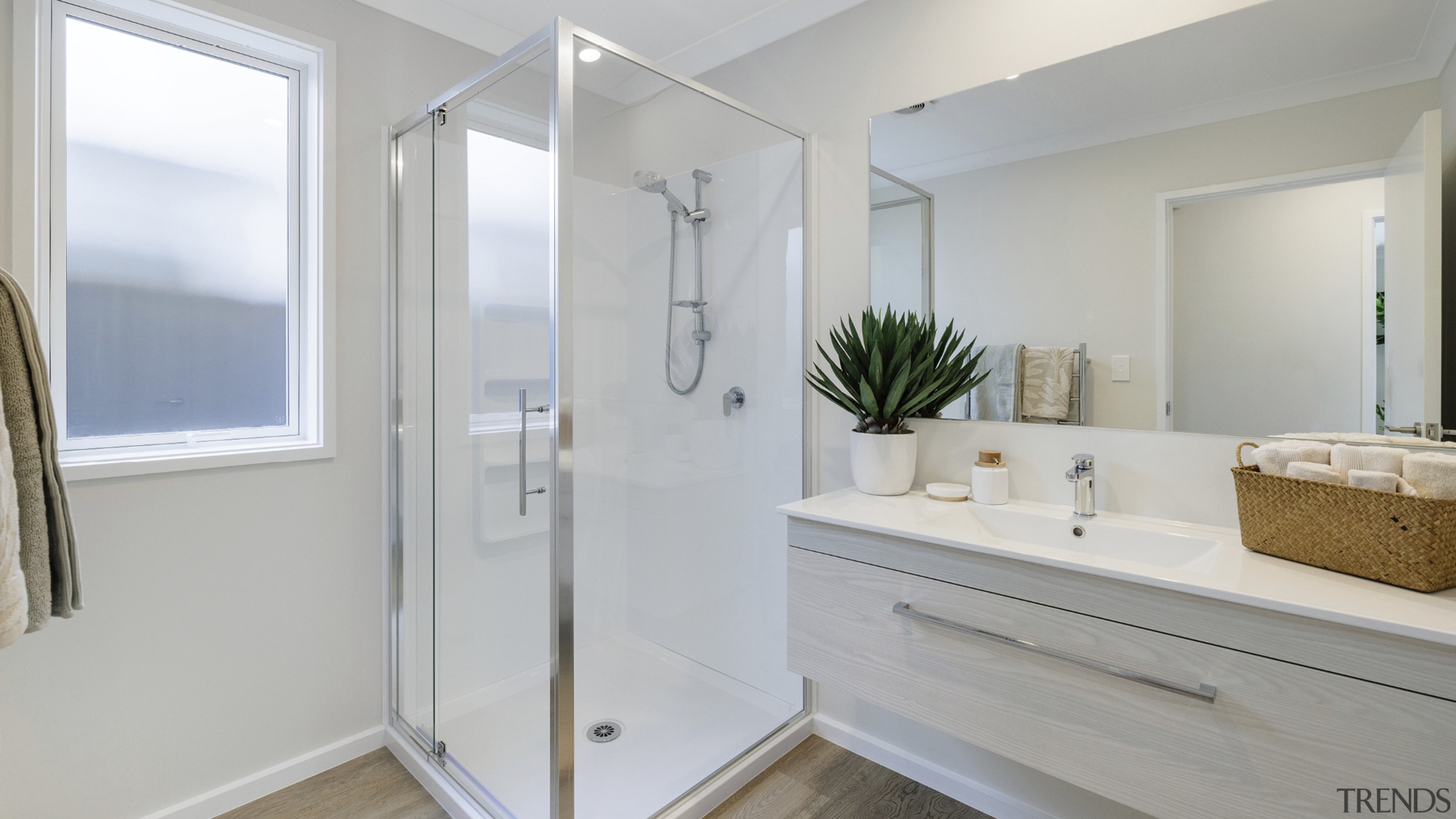 The downstairs/guest bathroom complete with privacy window glass 