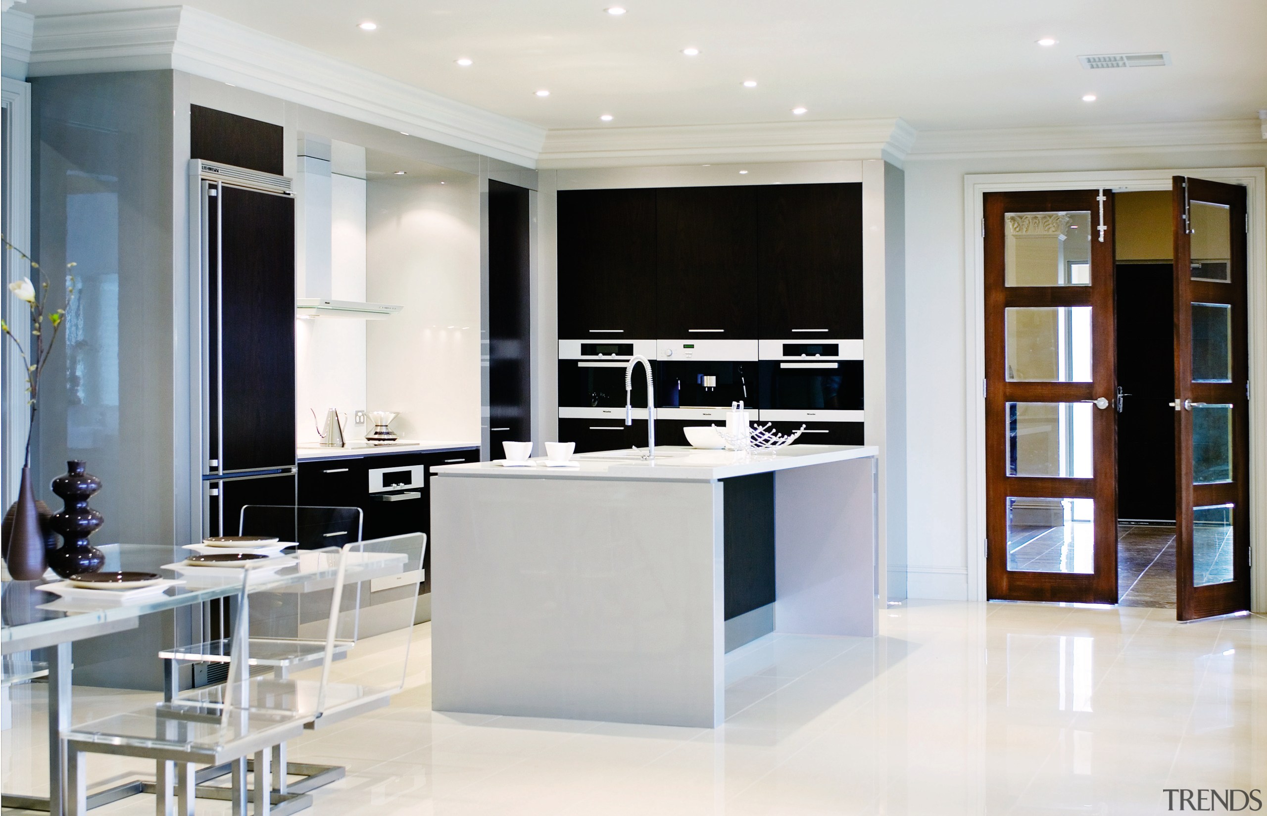 A view of the kitcyhen area, cream tiled cabinetry, countertop, cuisine classique, floor, flooring, furniture, interior design, kitchen, room, shelving, white, gray