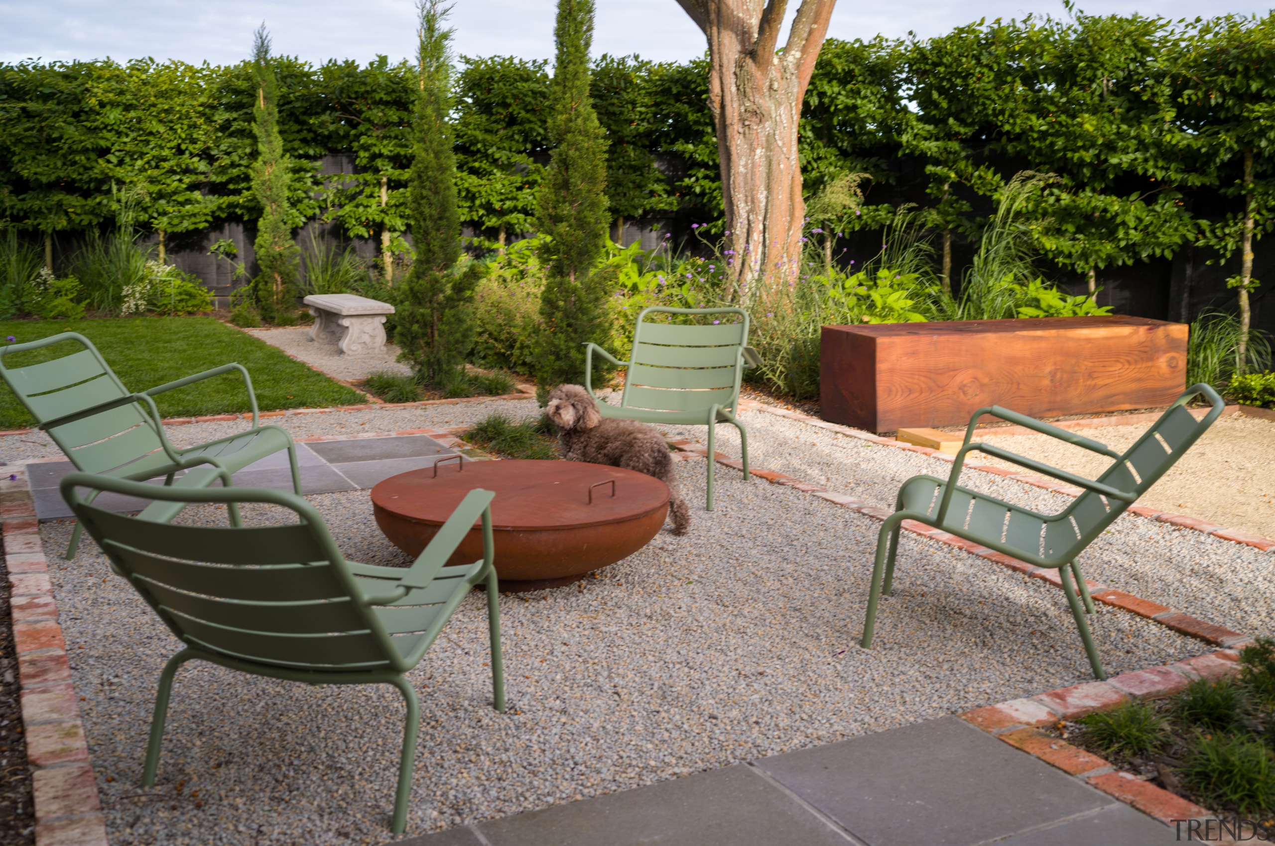 Al fresco confab/dining area with pétanque piste behind. 