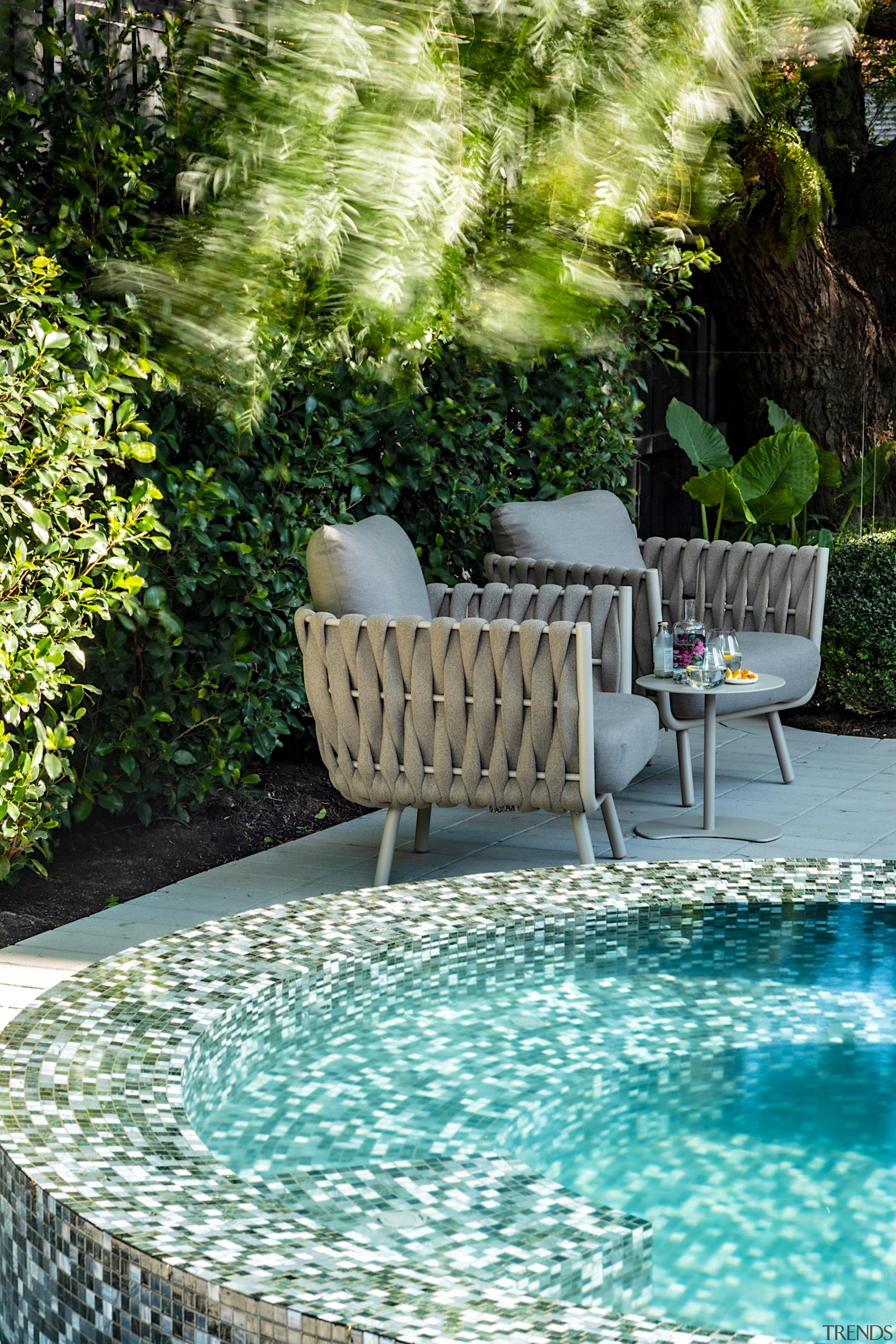 Spa-side relaxation. - Under the spreading gum tree 