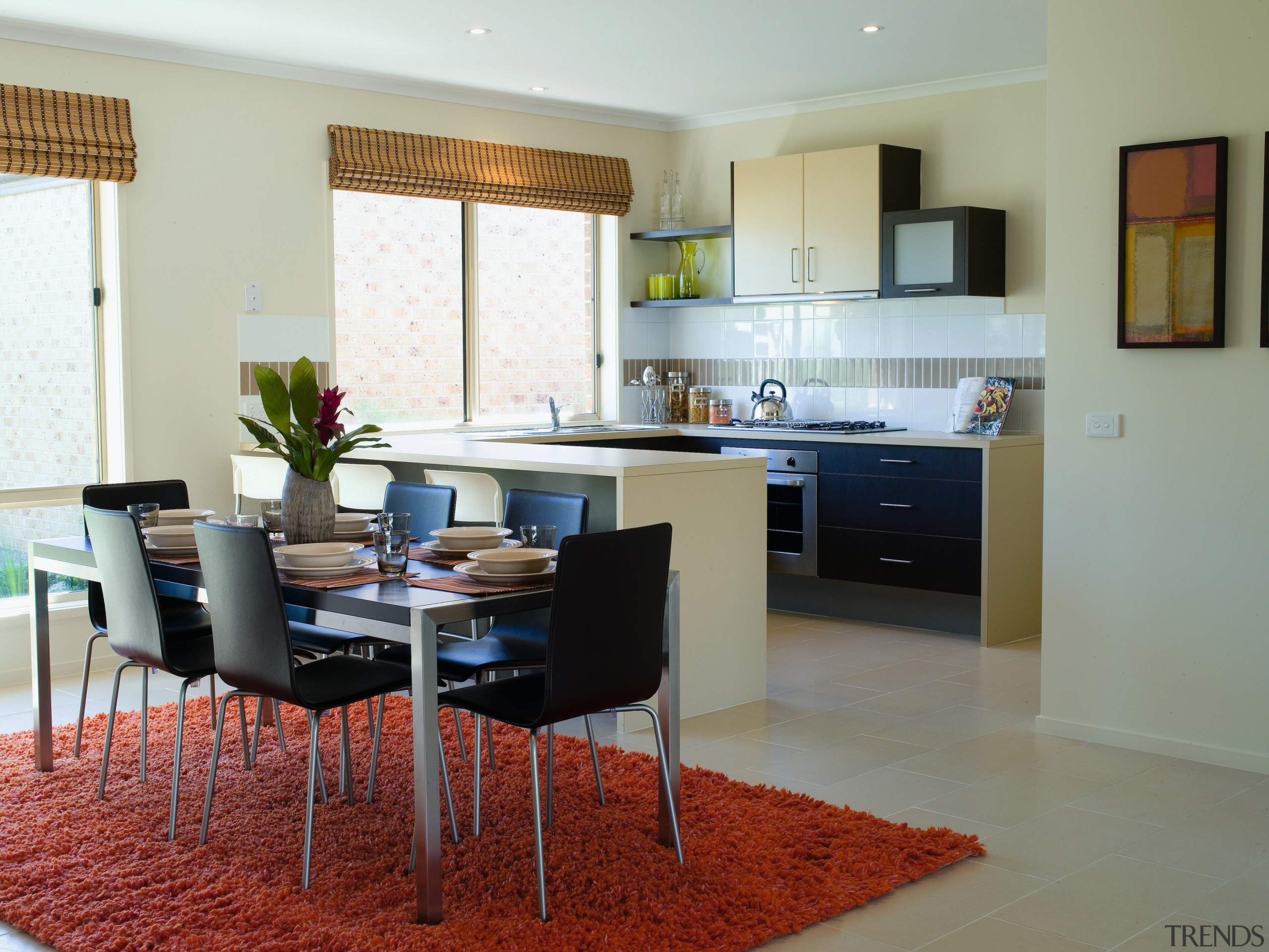 Kitchen and dining area with stainless steel framed countertop, dining room, floor, flooring, interior design, kitchen, living room, real estate, room, table, gray
