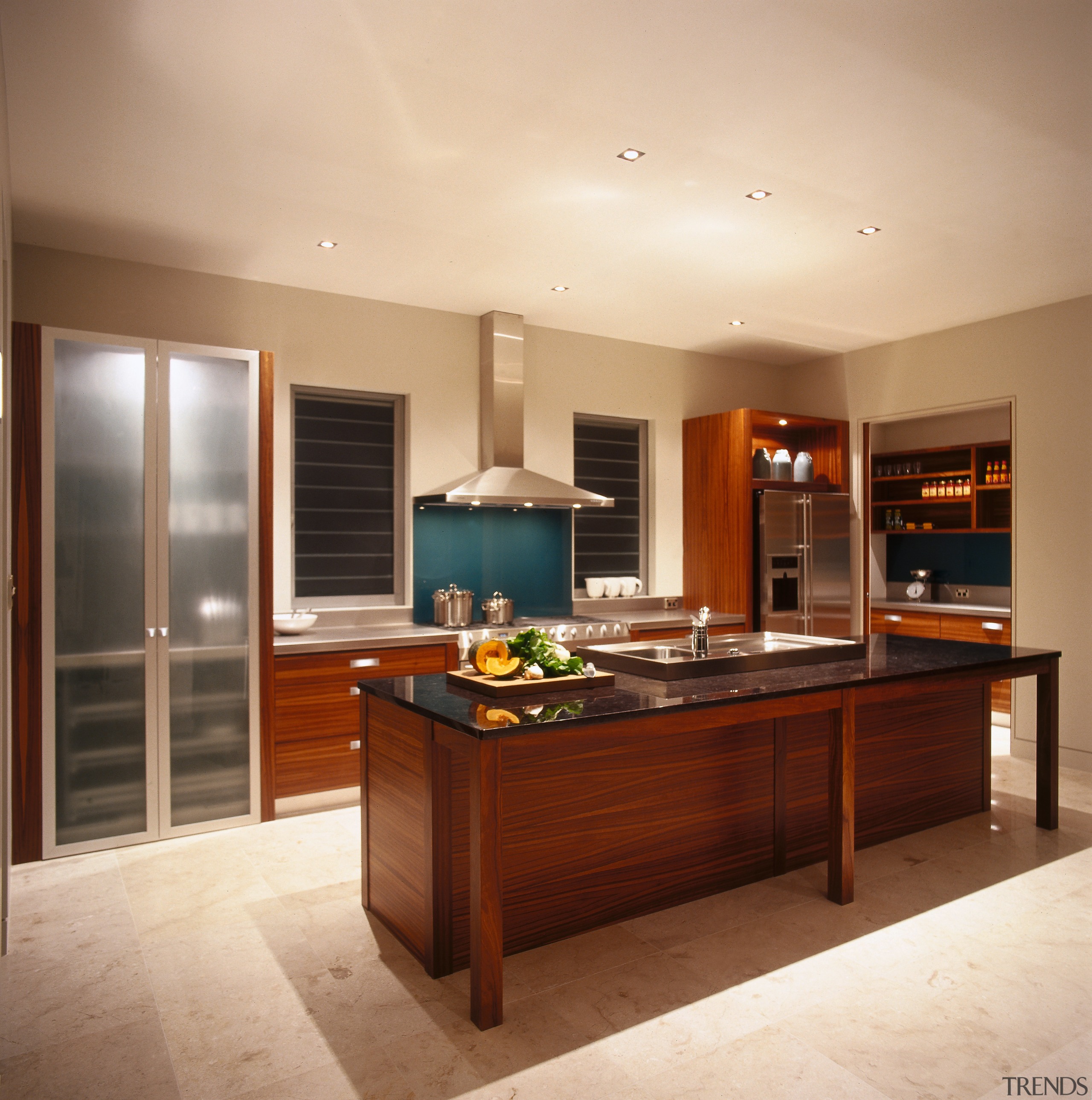 A view of a kitchen, wooden cabinetry, granite cabinetry, countertop, cuisine classique, floor, flooring, hardwood, interior design, kitchen, real estate, room, orange, brown