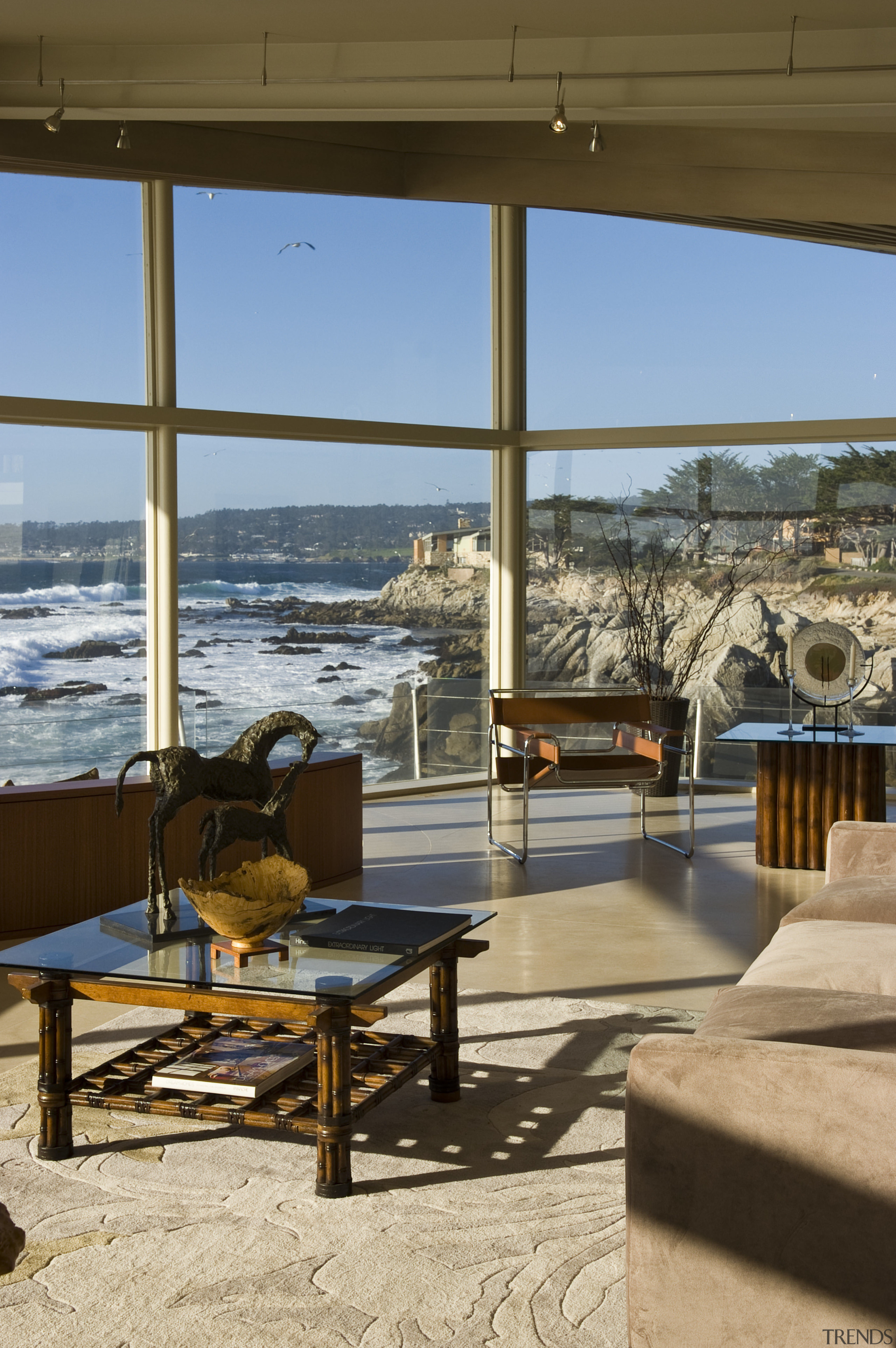 View of the oceanfront Butterfly House in Carmel home, real estate, sea, sky, table, water, window, wood, brown
