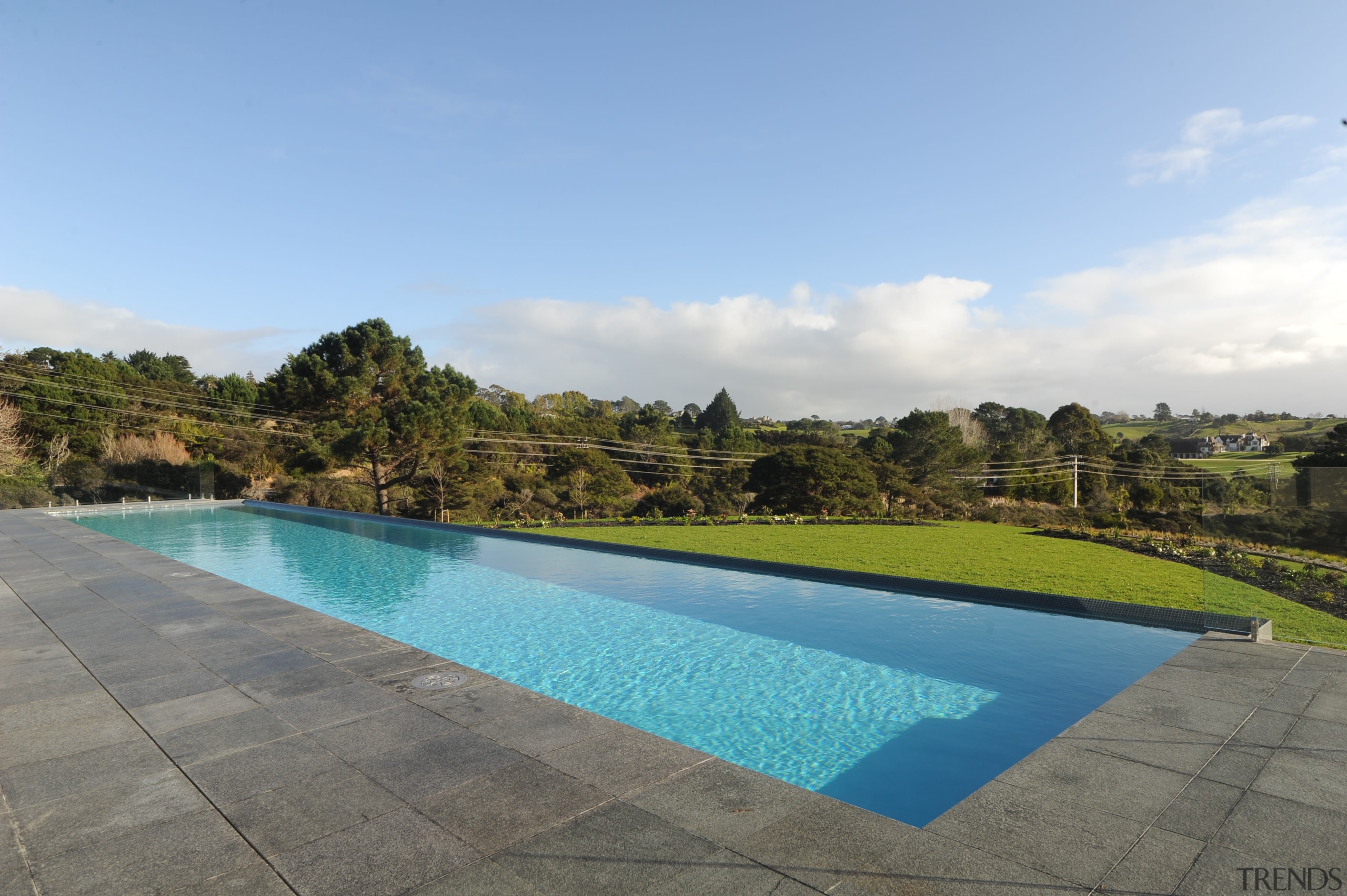 Frontier Pools built the 25m concrete pool on cloud, estate, landscape, leisure, property, real estate, reflection, sky, swimming pool, water, teal
