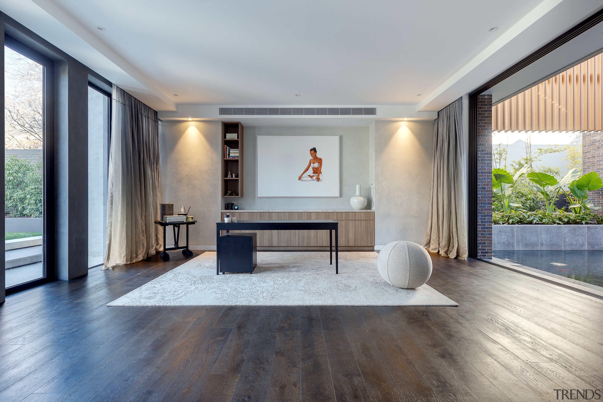 Wood floors run throughout the interior, including into 